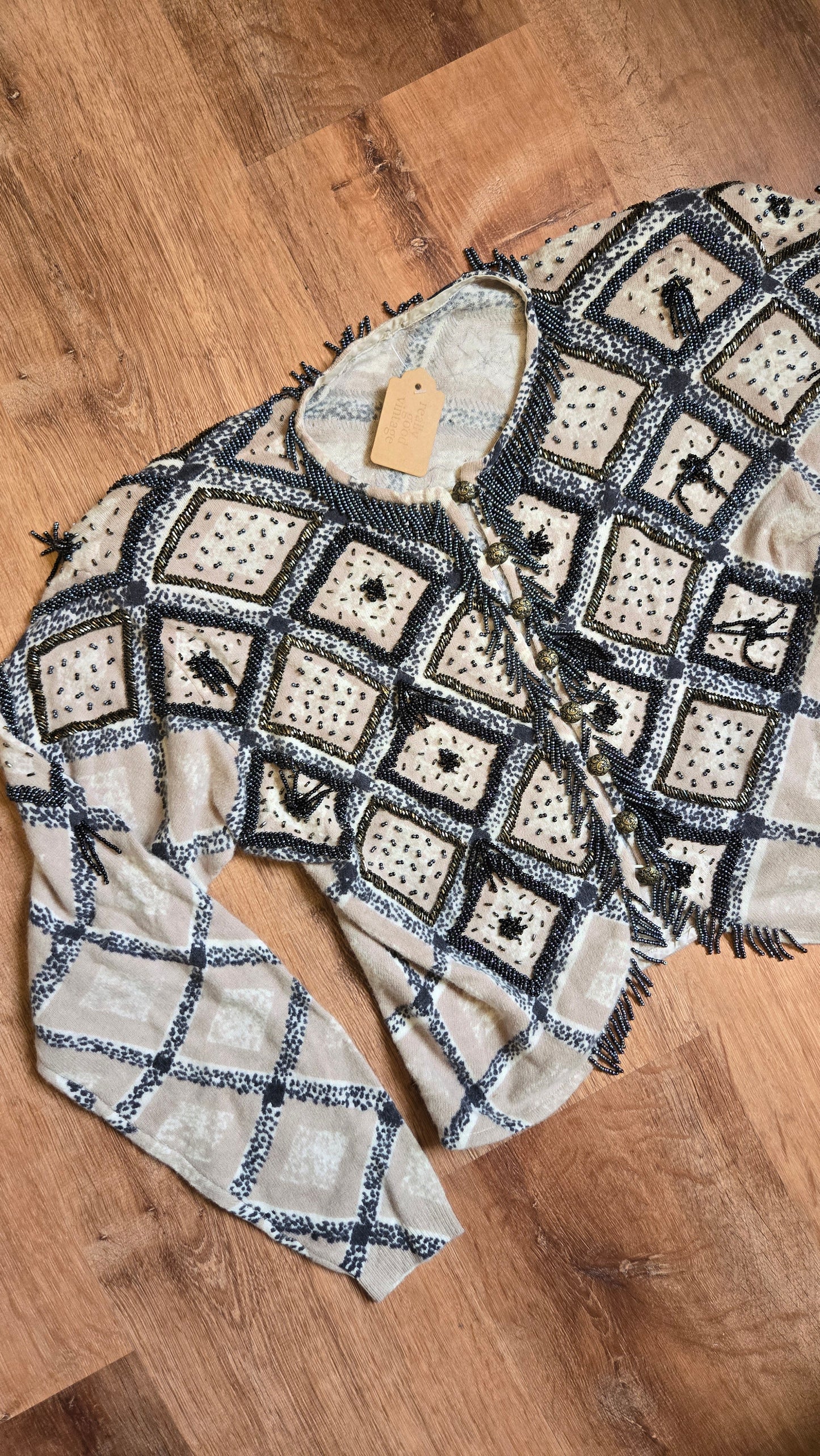 Hand-beaded cardigan - couture level!