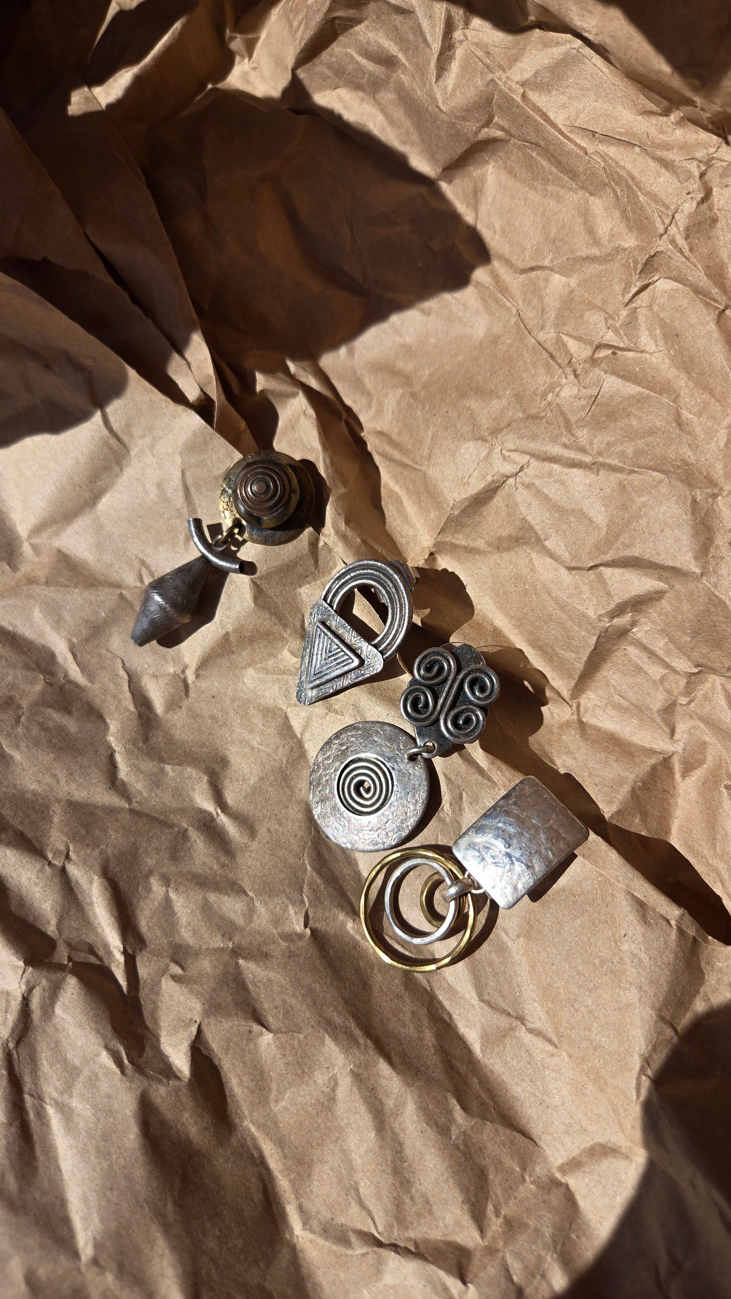 Mixed metal tubular drop earrings