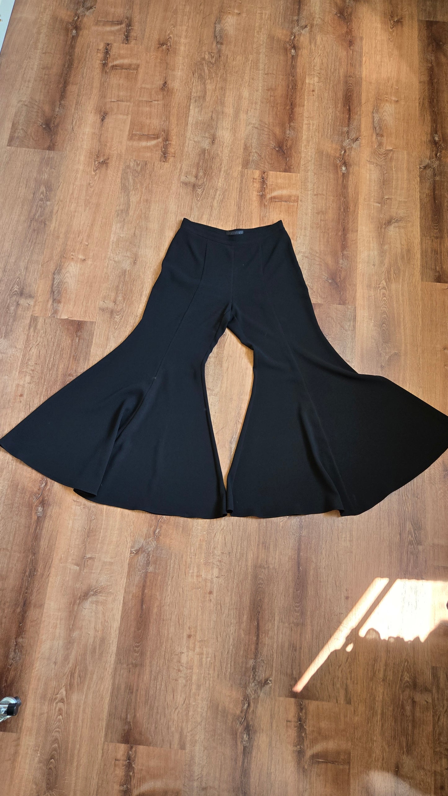 Giant black bell bottoms