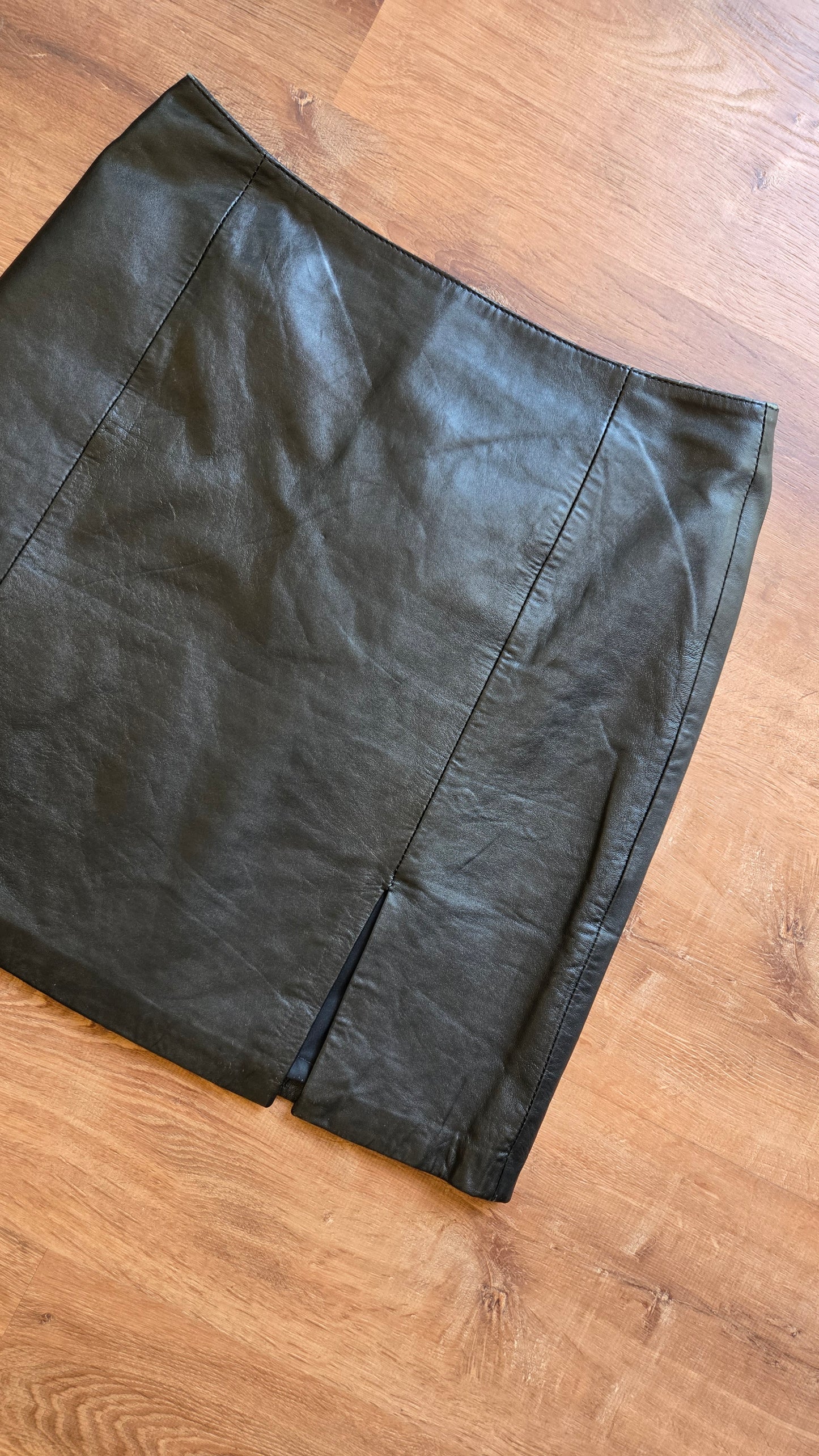 Black leather slit miniskirt