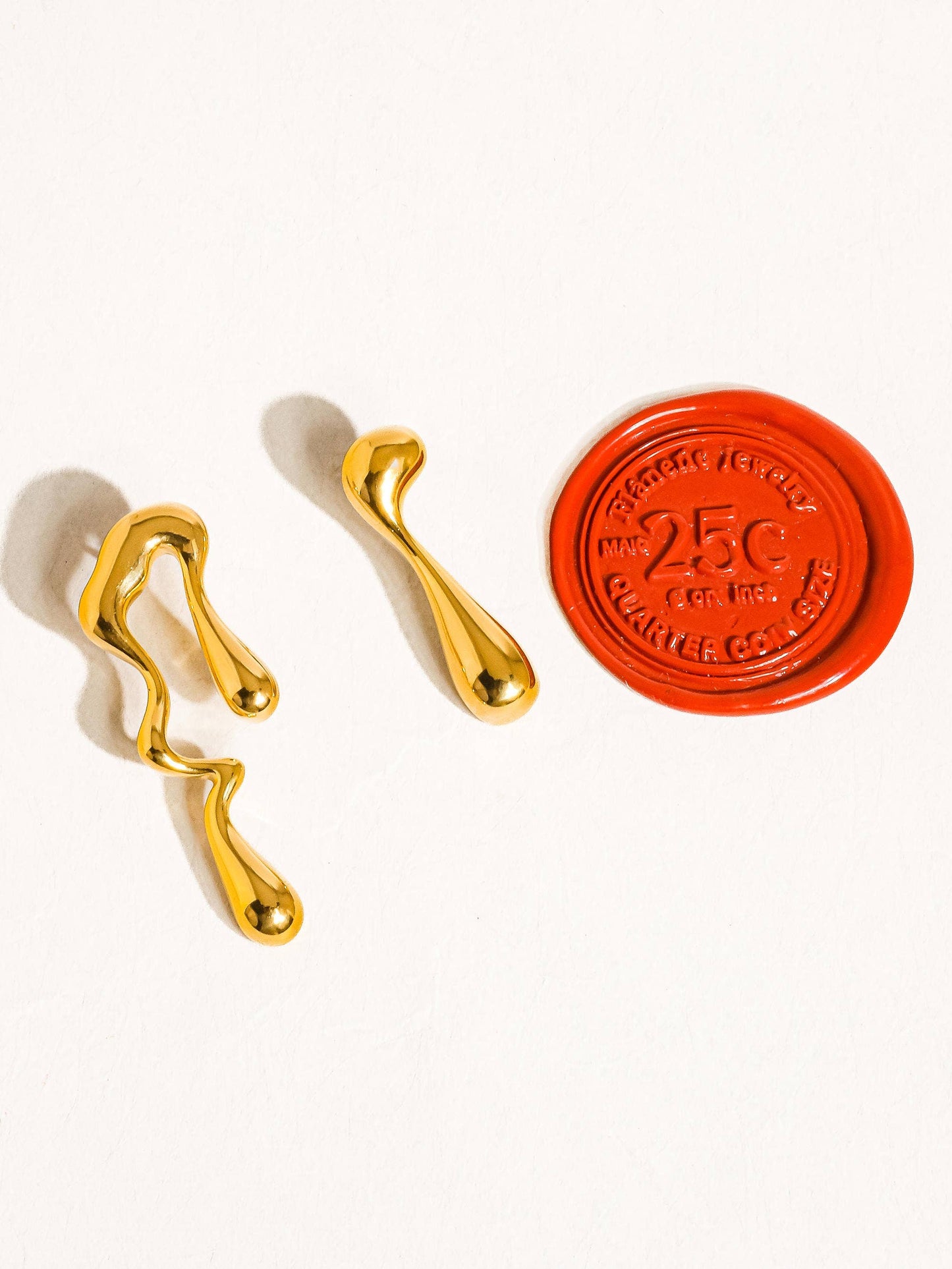 Roma gold mismatch melted earring