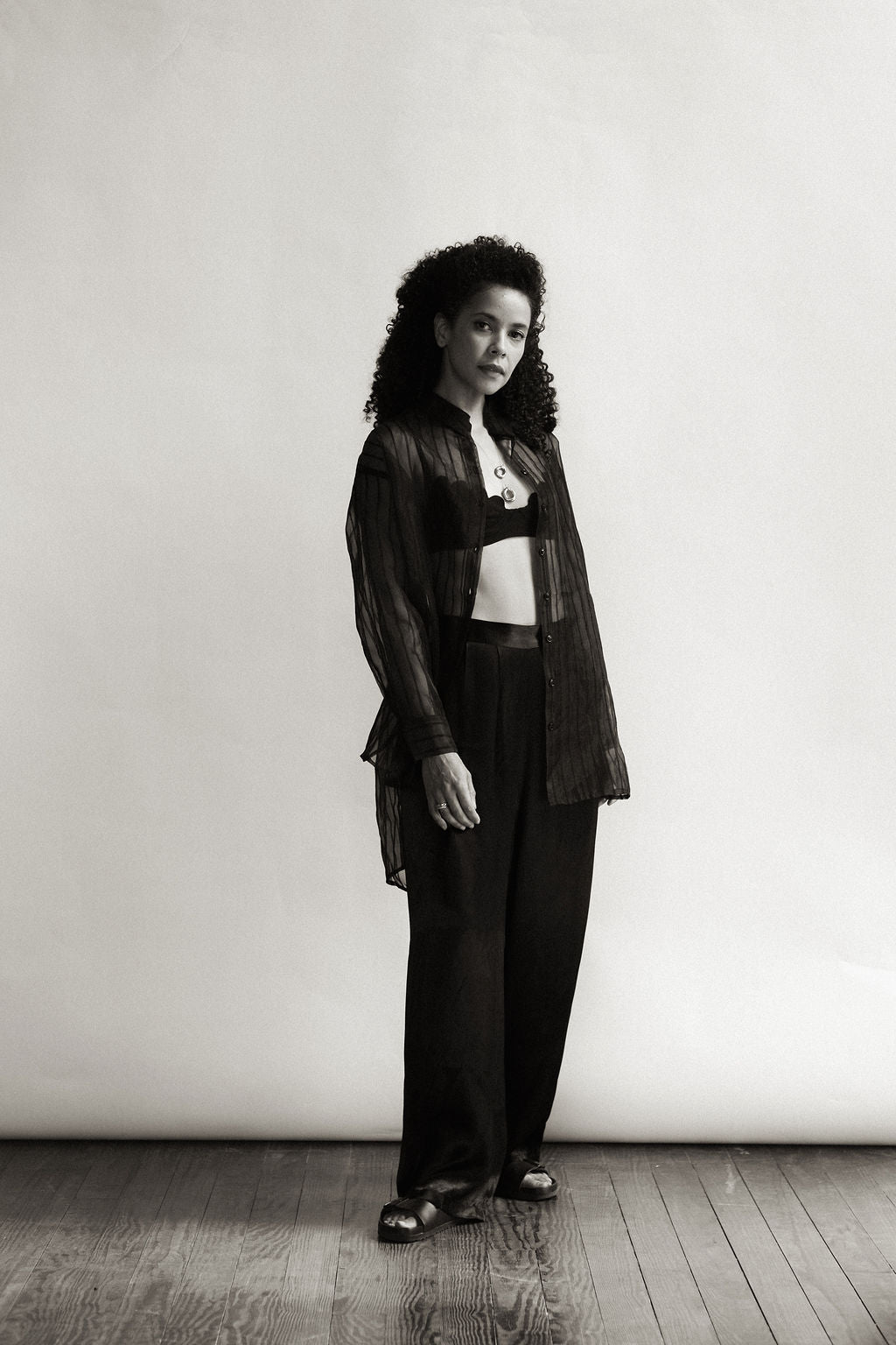 Black oversized sheer pinstripe blouse