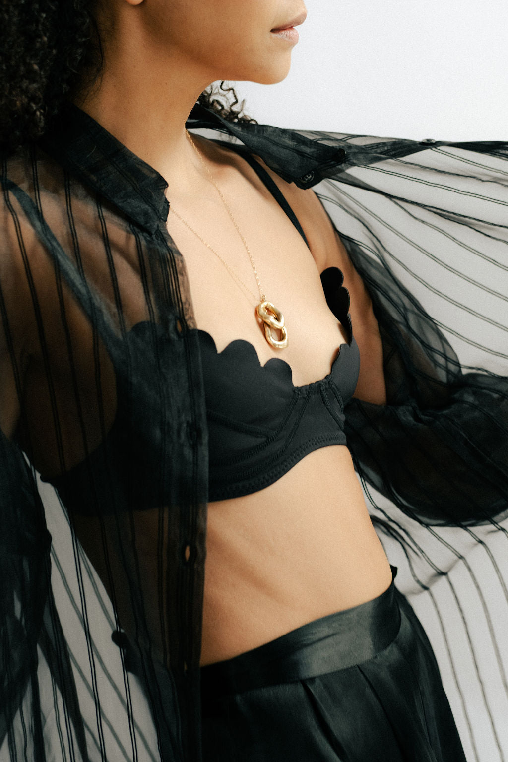 Black oversized sheer pinstripe blouse