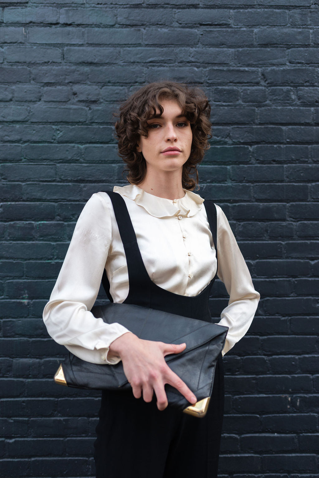 Lou Taylor black envelope clutch w metal hardware