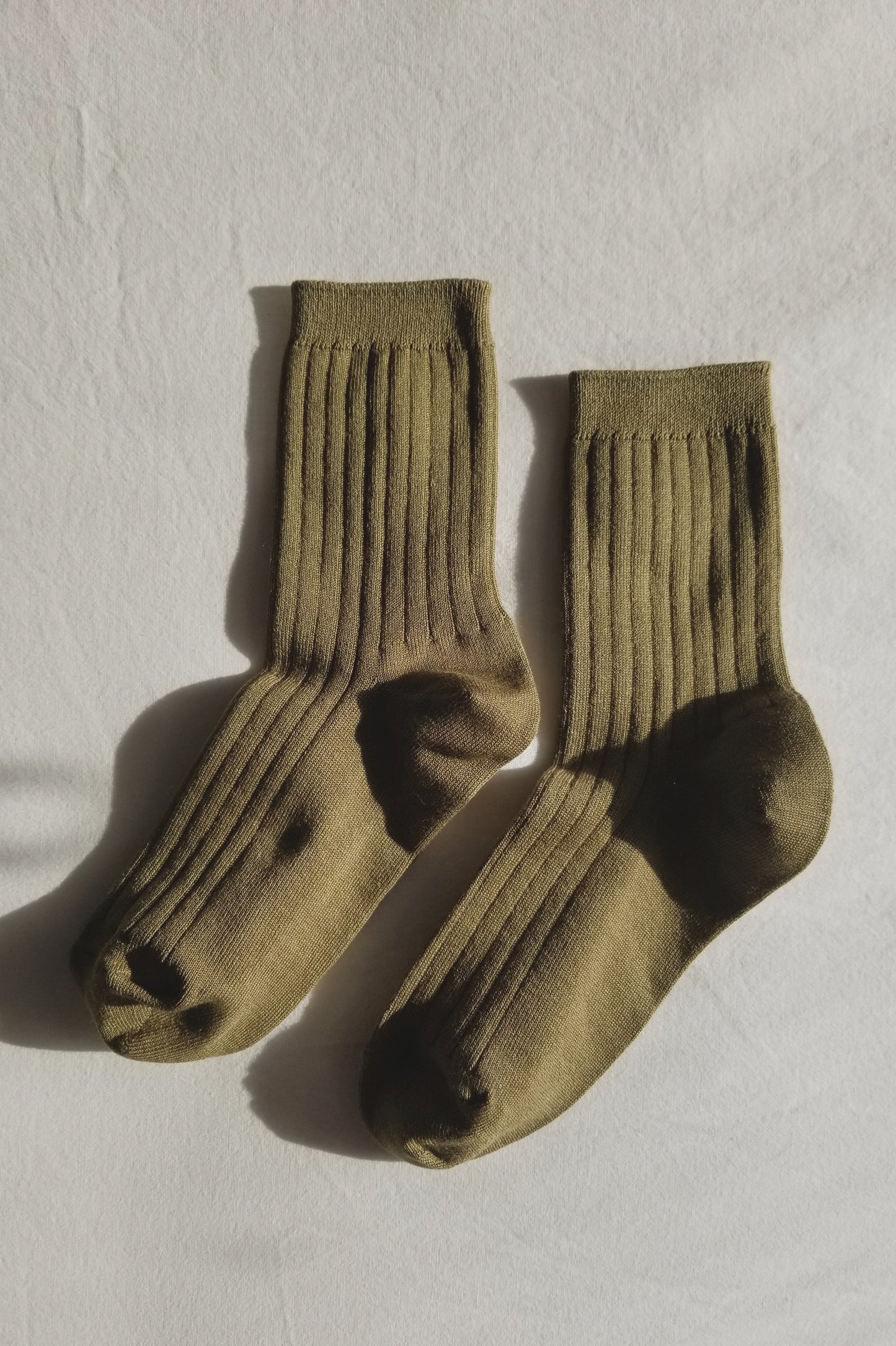 Her socks - pesto