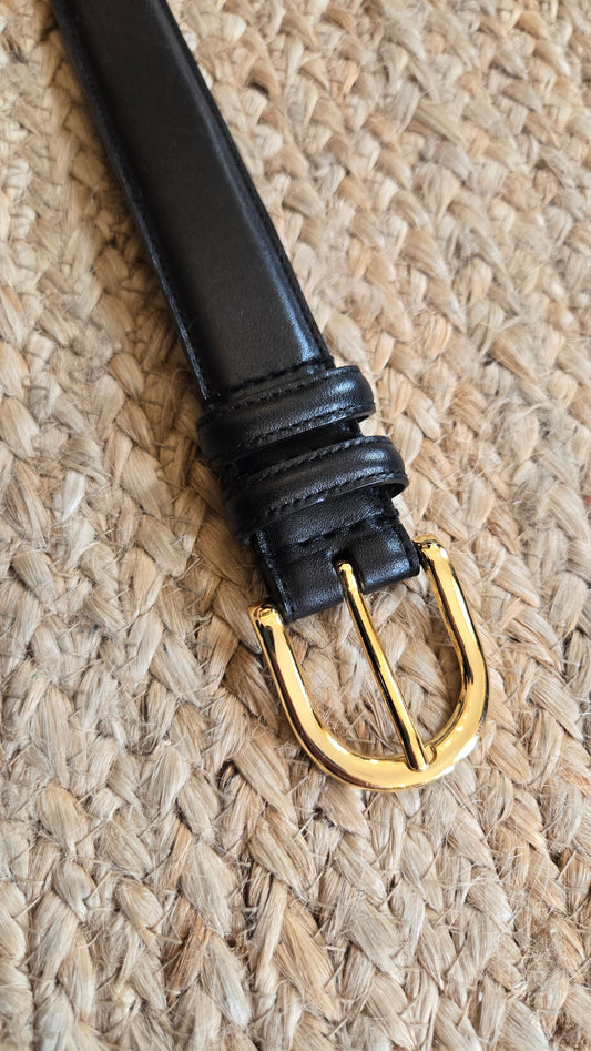 Black leather belt with gold buckle