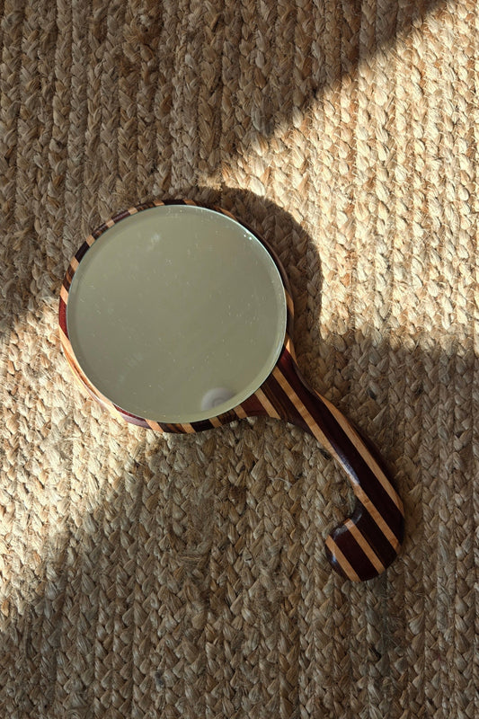 Striped wooden hand mirror