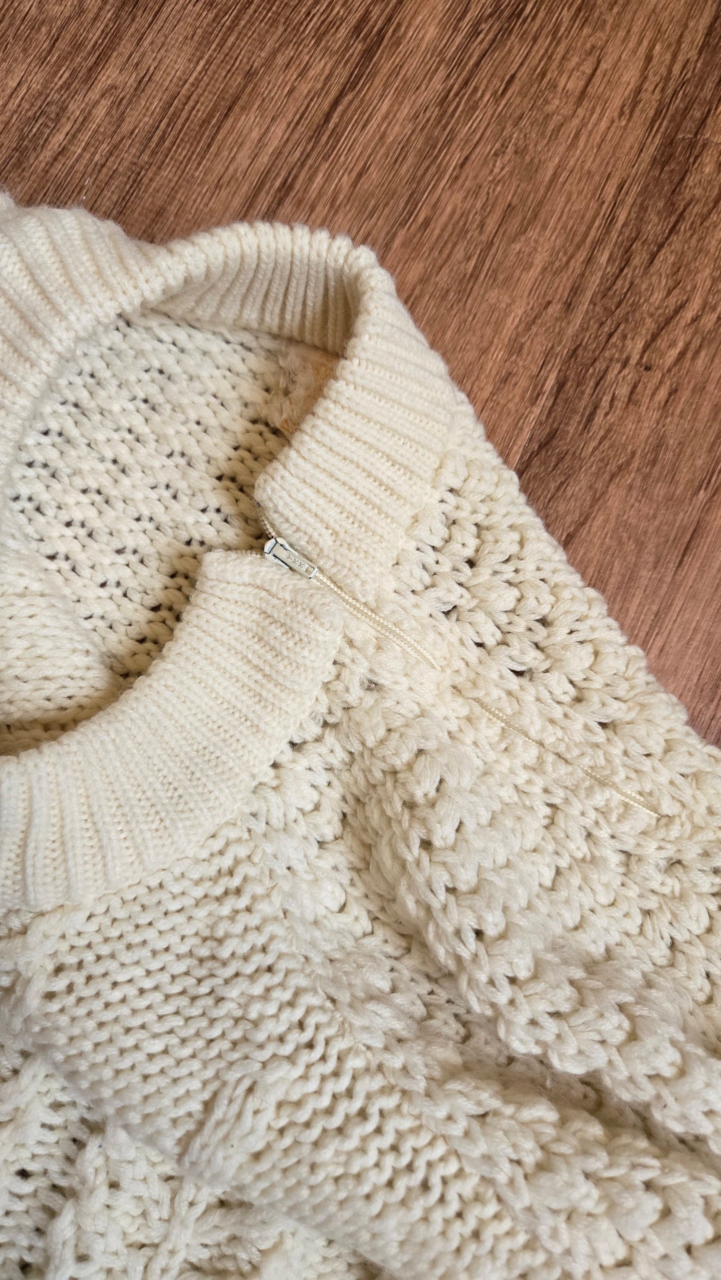 Cream Aran-style sweater