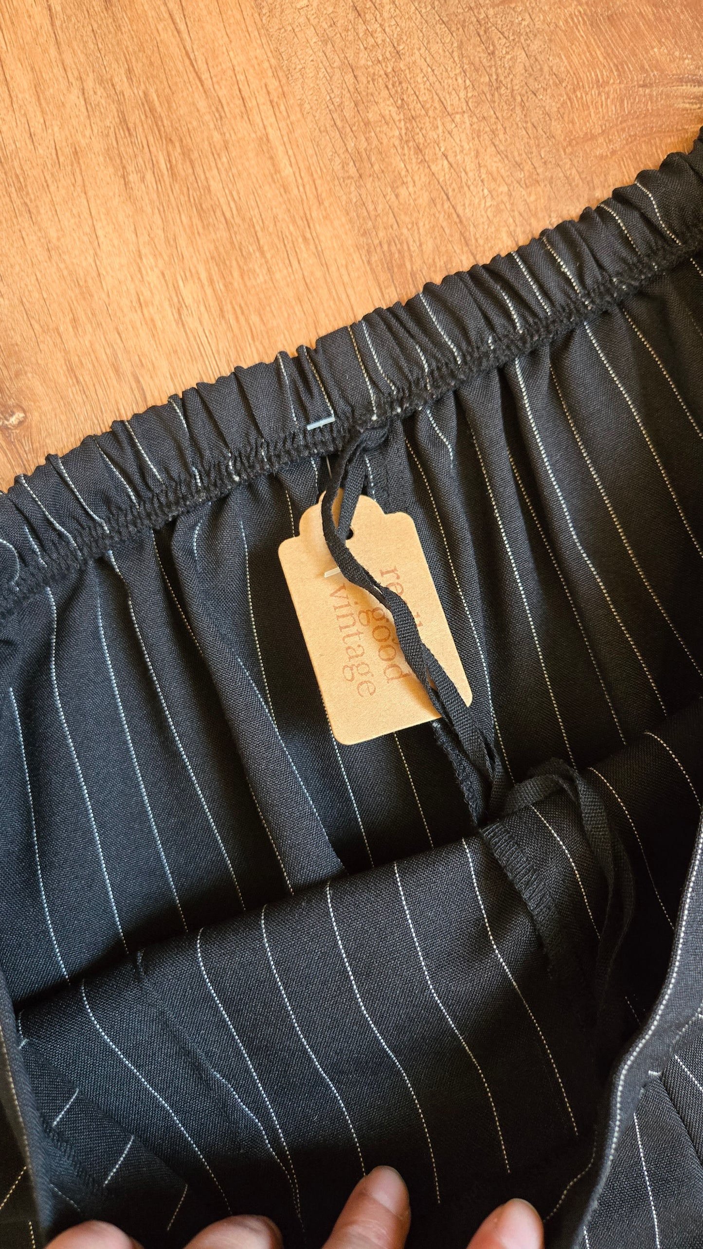 Black pinstripe pants