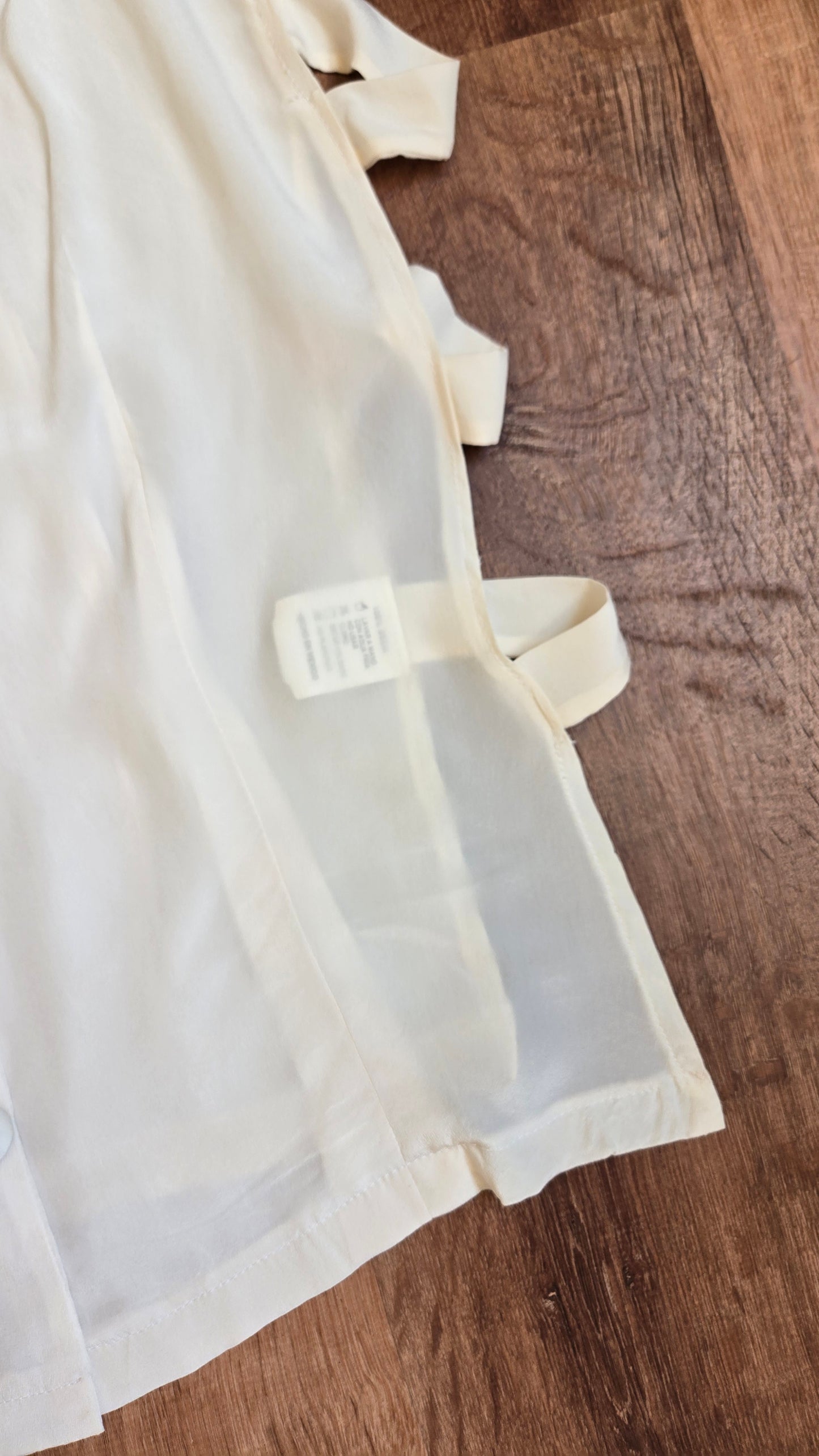 Open side cream silk blouse