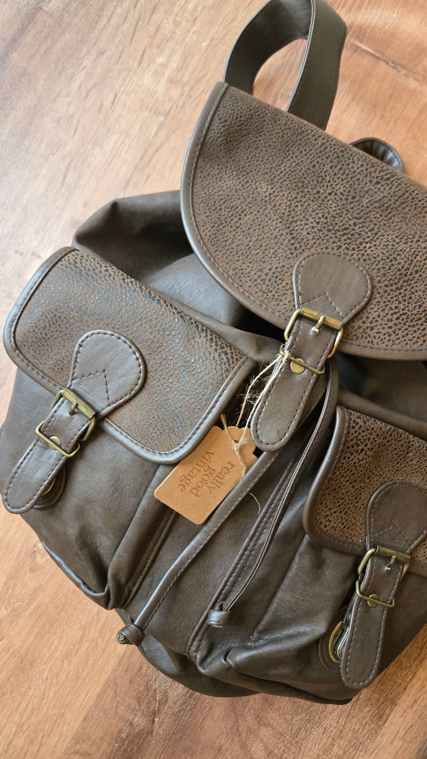 Dark brown pebbled leather backpack