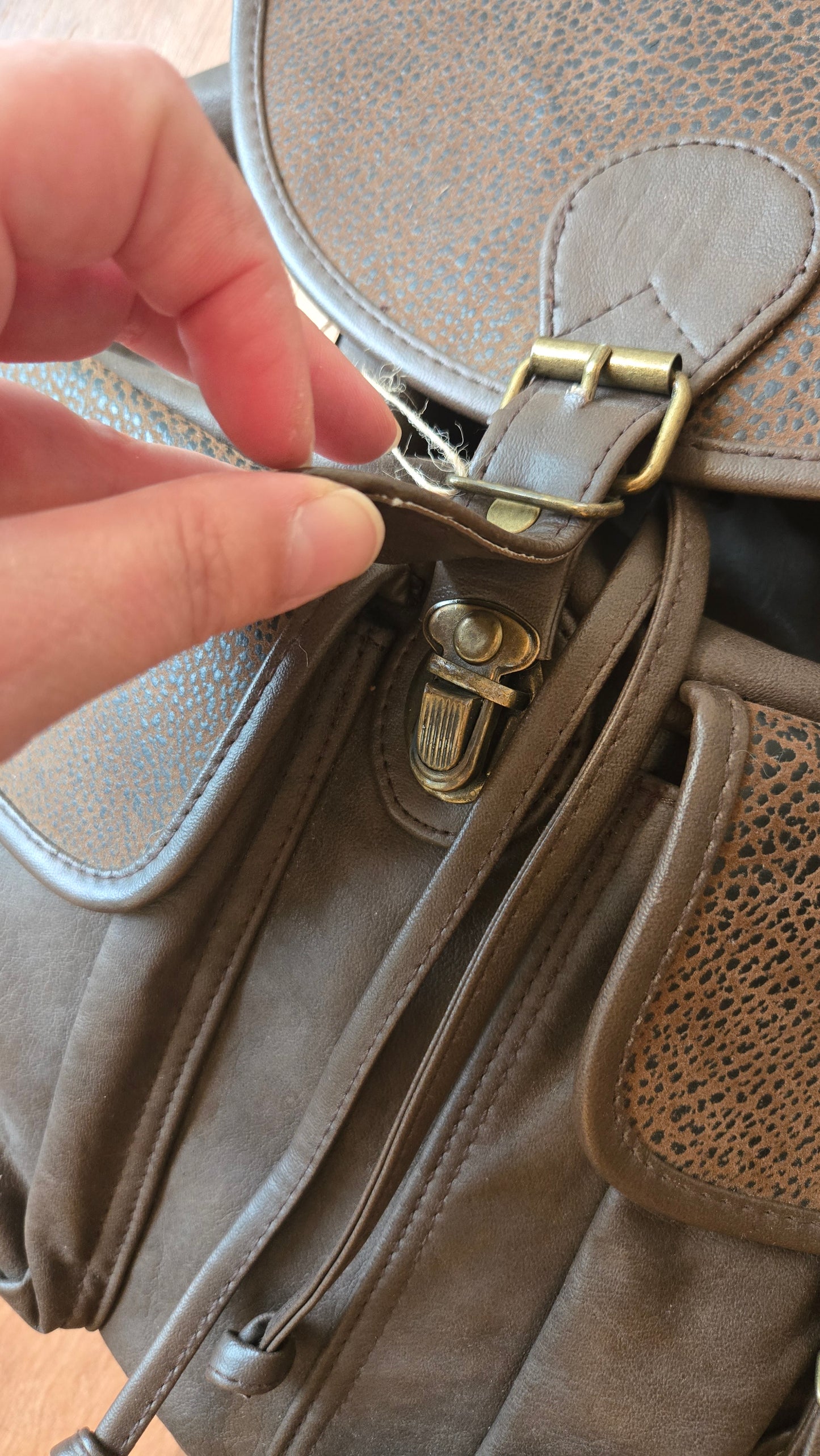 Dark brown pebbled leather backpack