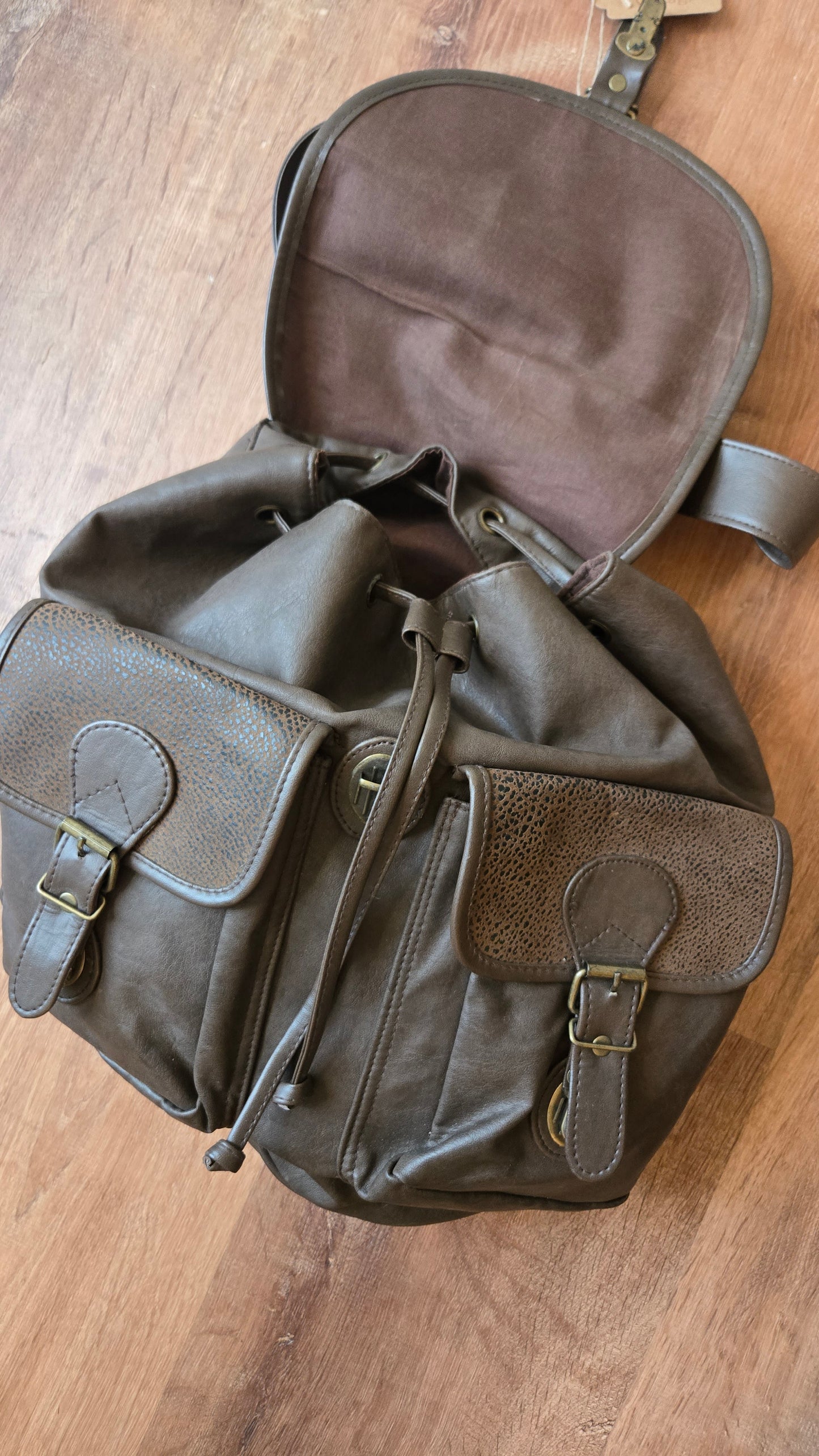 Dark brown pebbled leather backpack