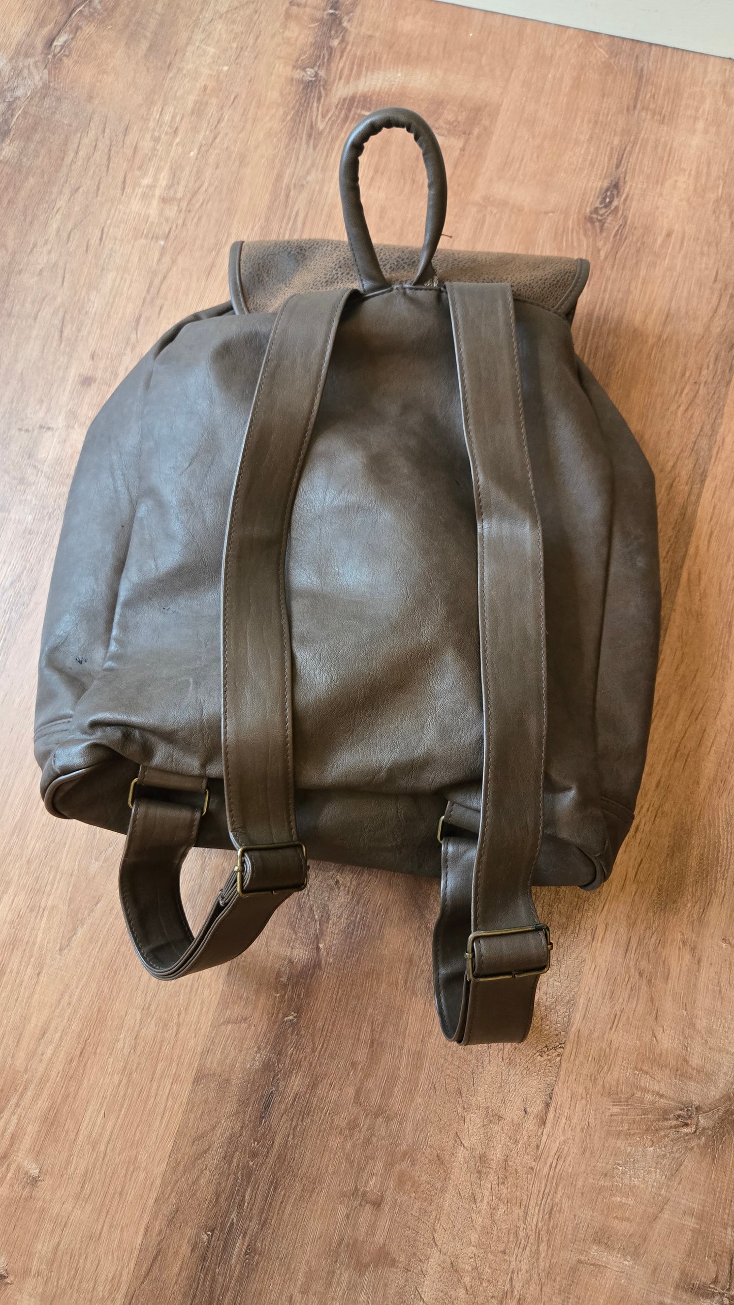 Dark brown pebbled leather backpack