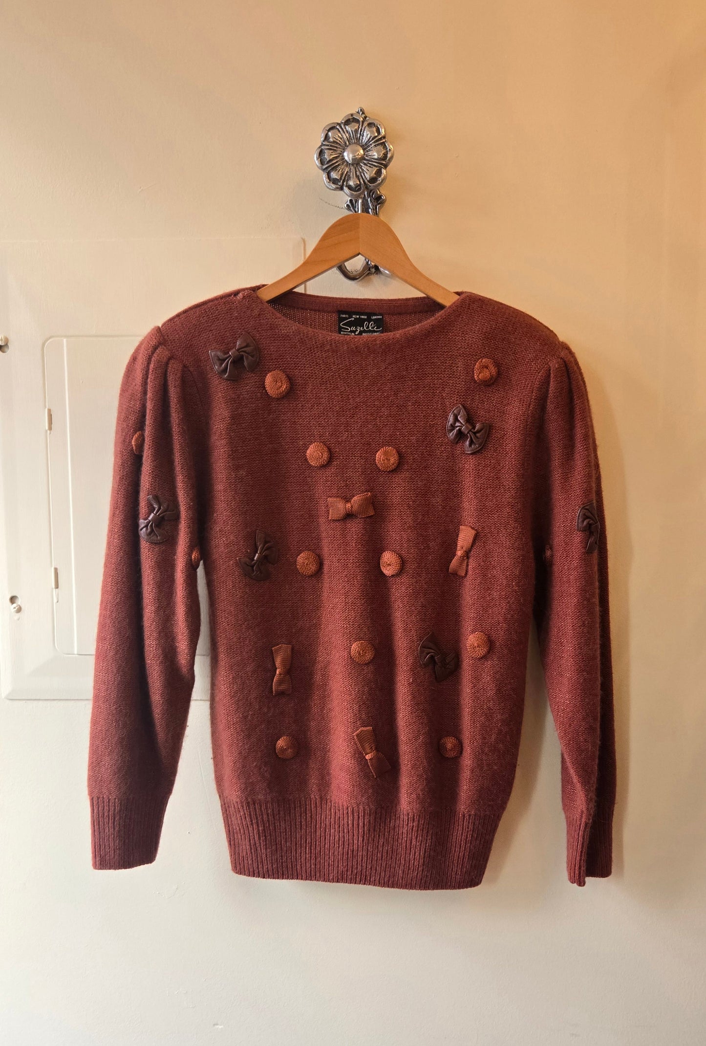 Suzelle rust bow angora sweater
