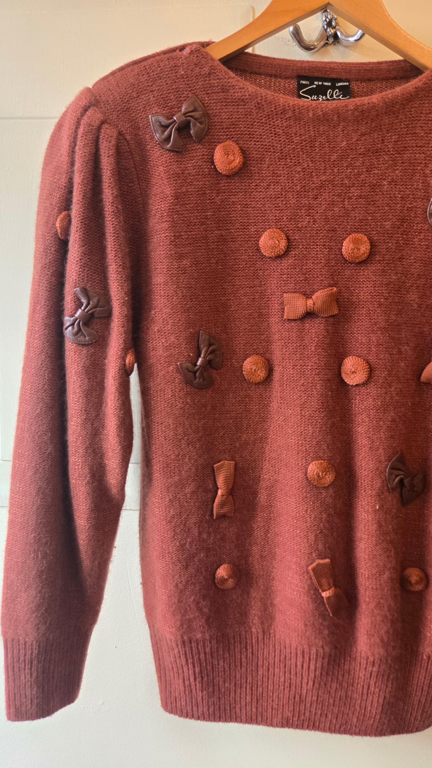 Suzelle rust bow angora sweater
