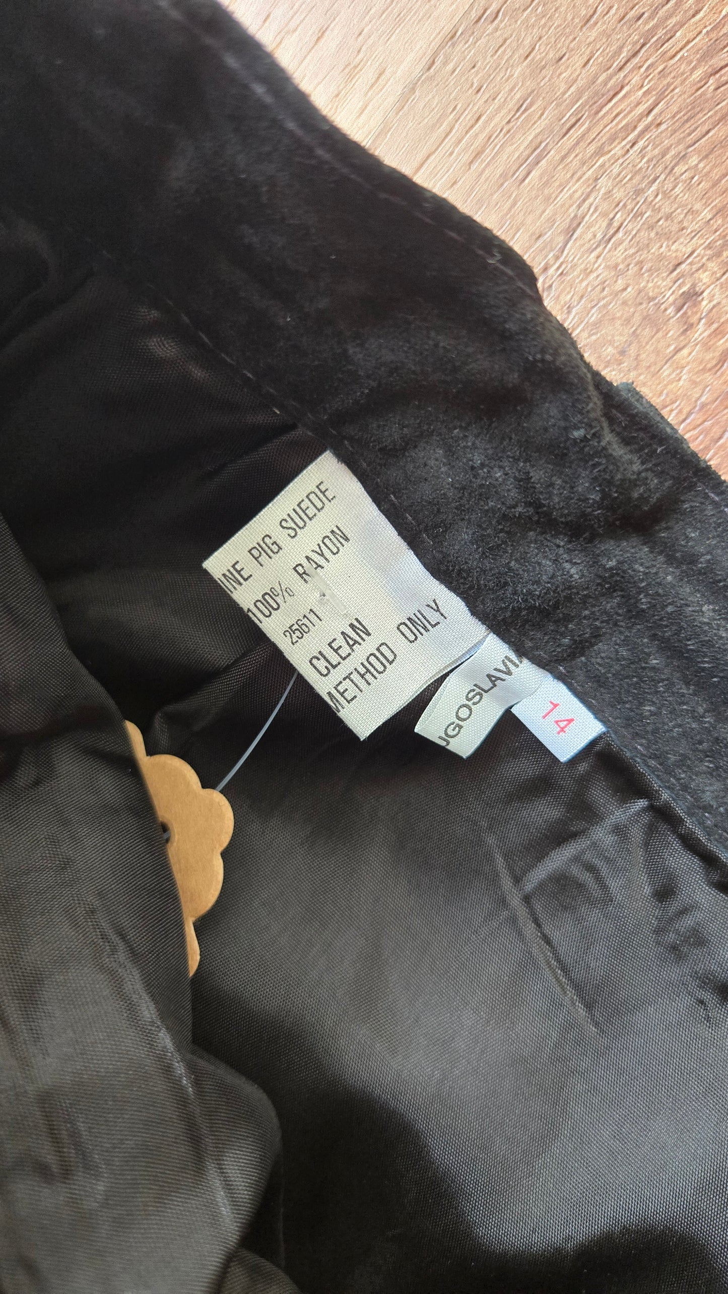 Black button-front suede skirt