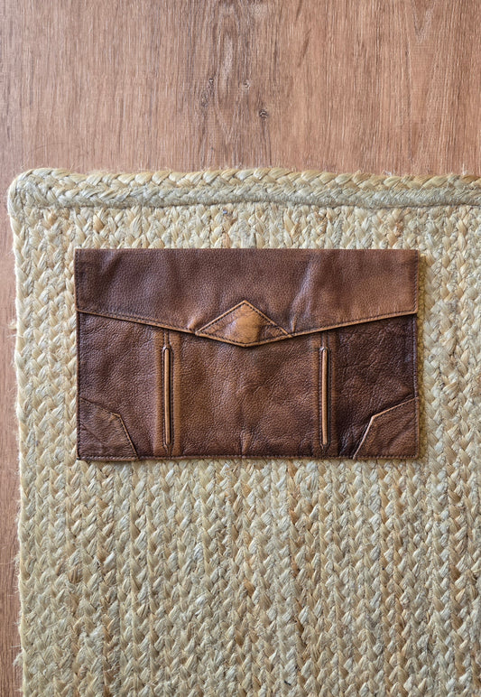 Brown leather envelope clutch