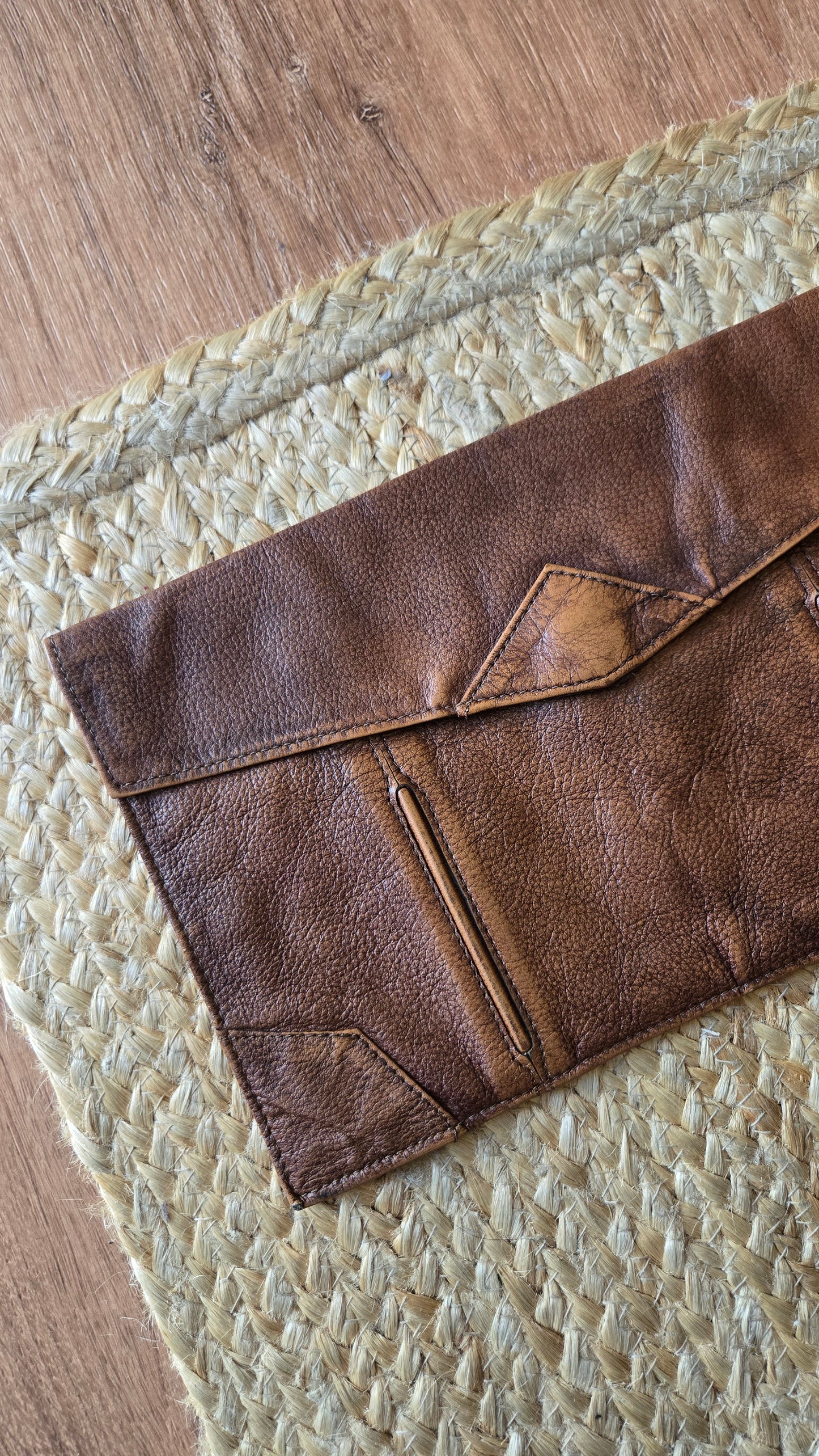 Brown leather envelope clutch