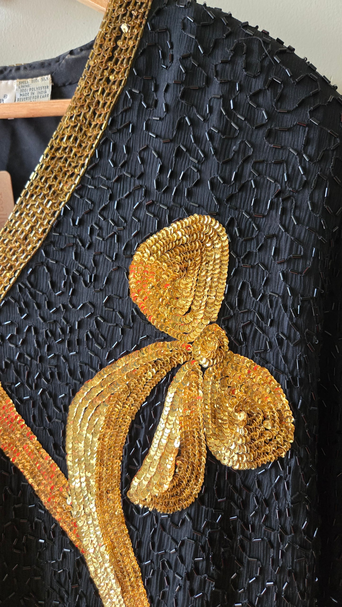 Lawrence Kazar black & gold beaded bow top