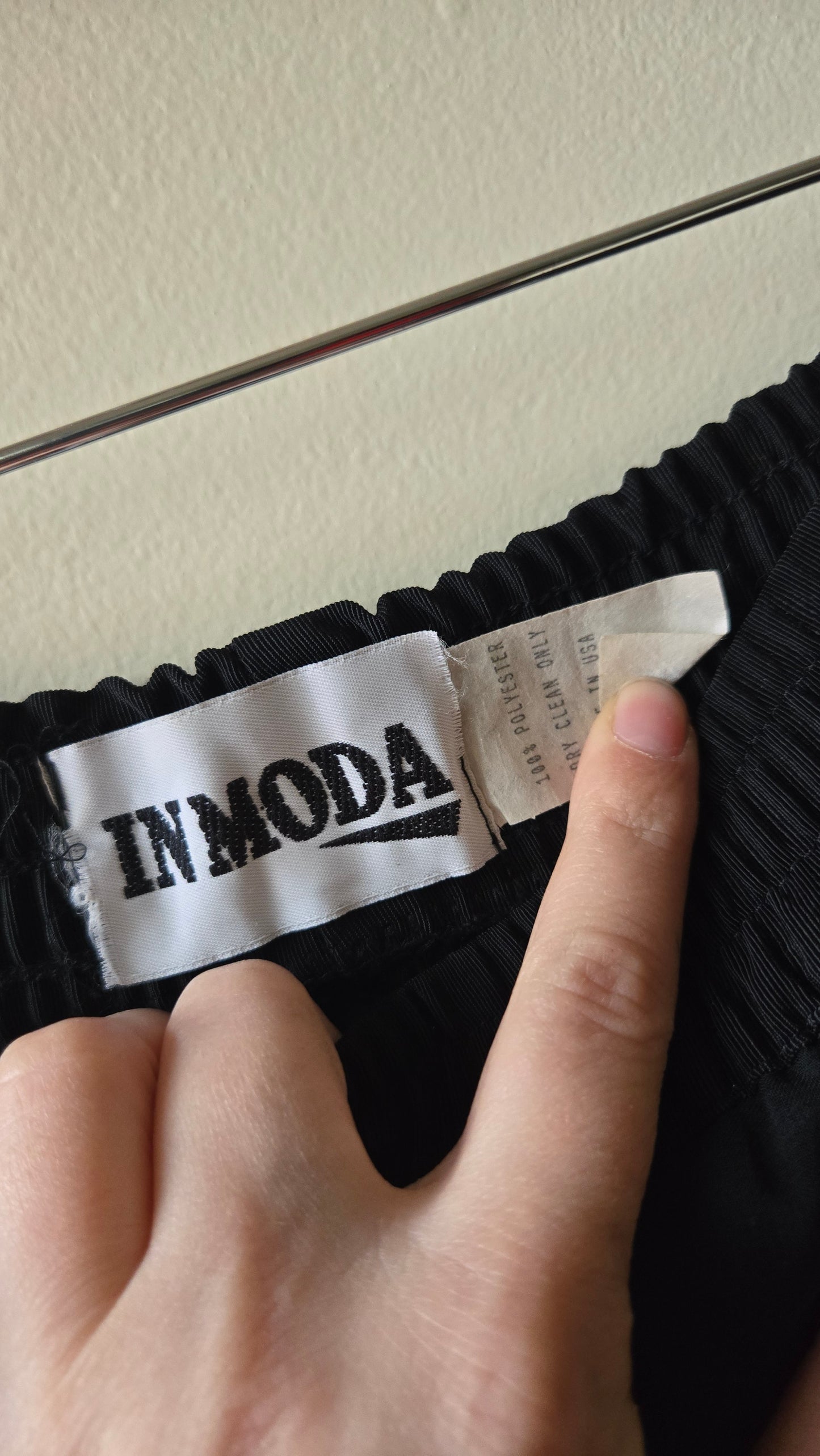 Sheer black pleated palazzo pants