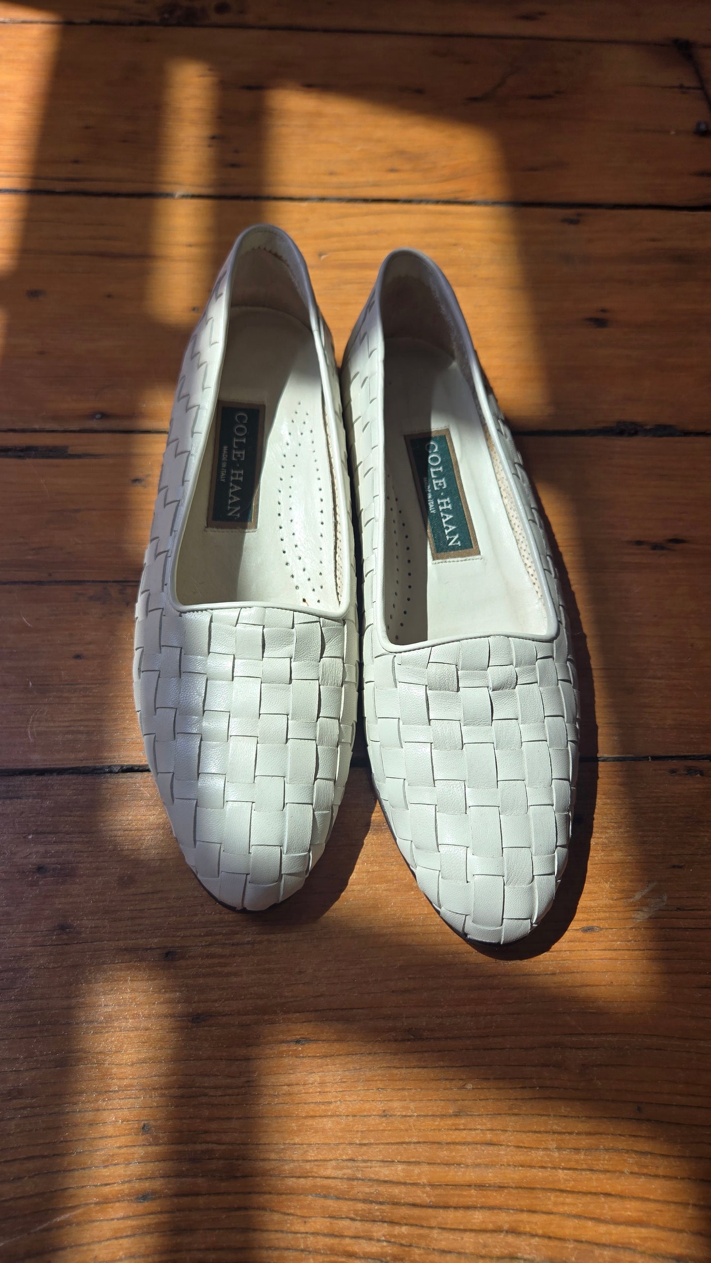 Cole Haan white woven leather loafers