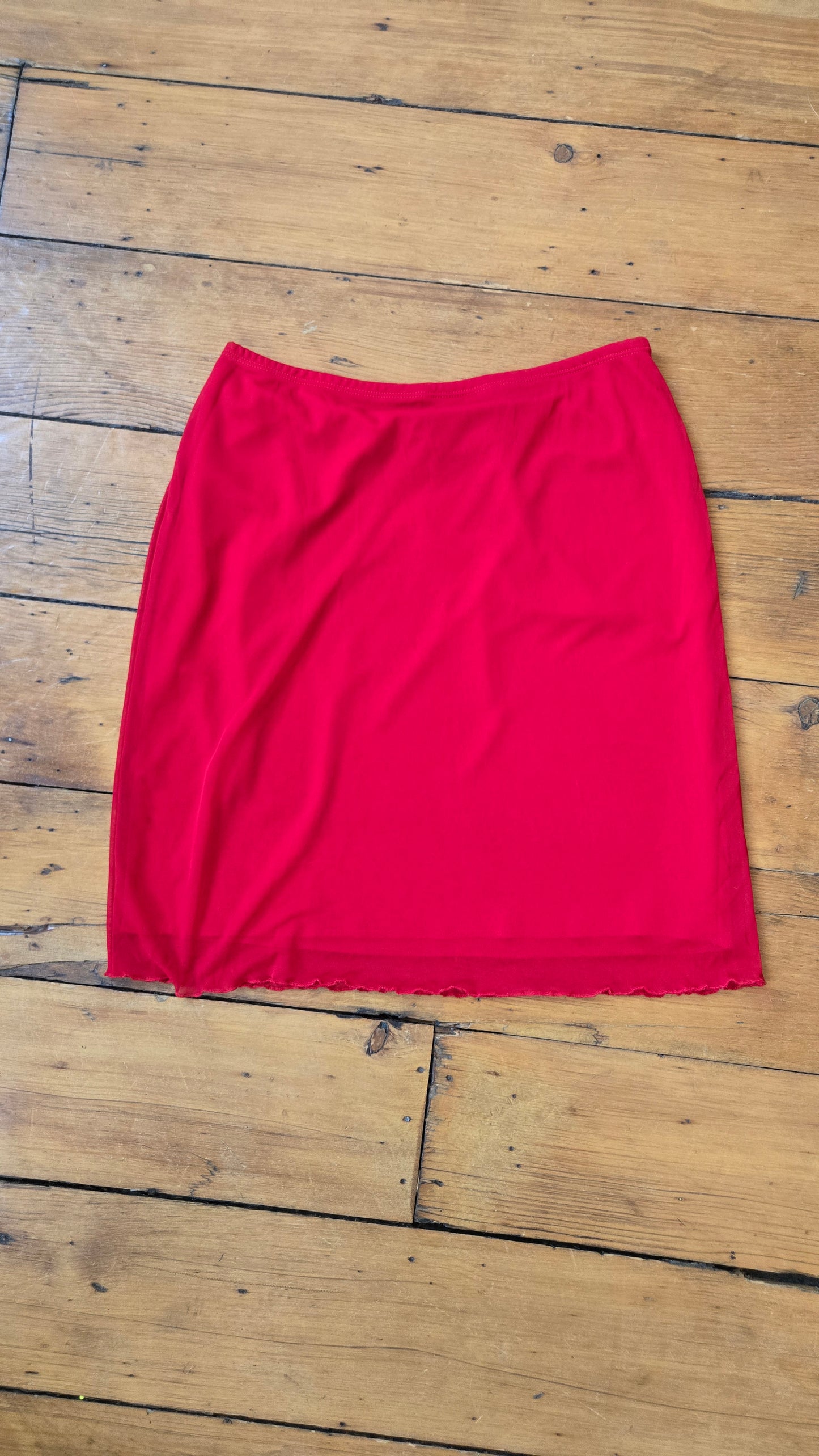Red mesh skirt w lettuce hem