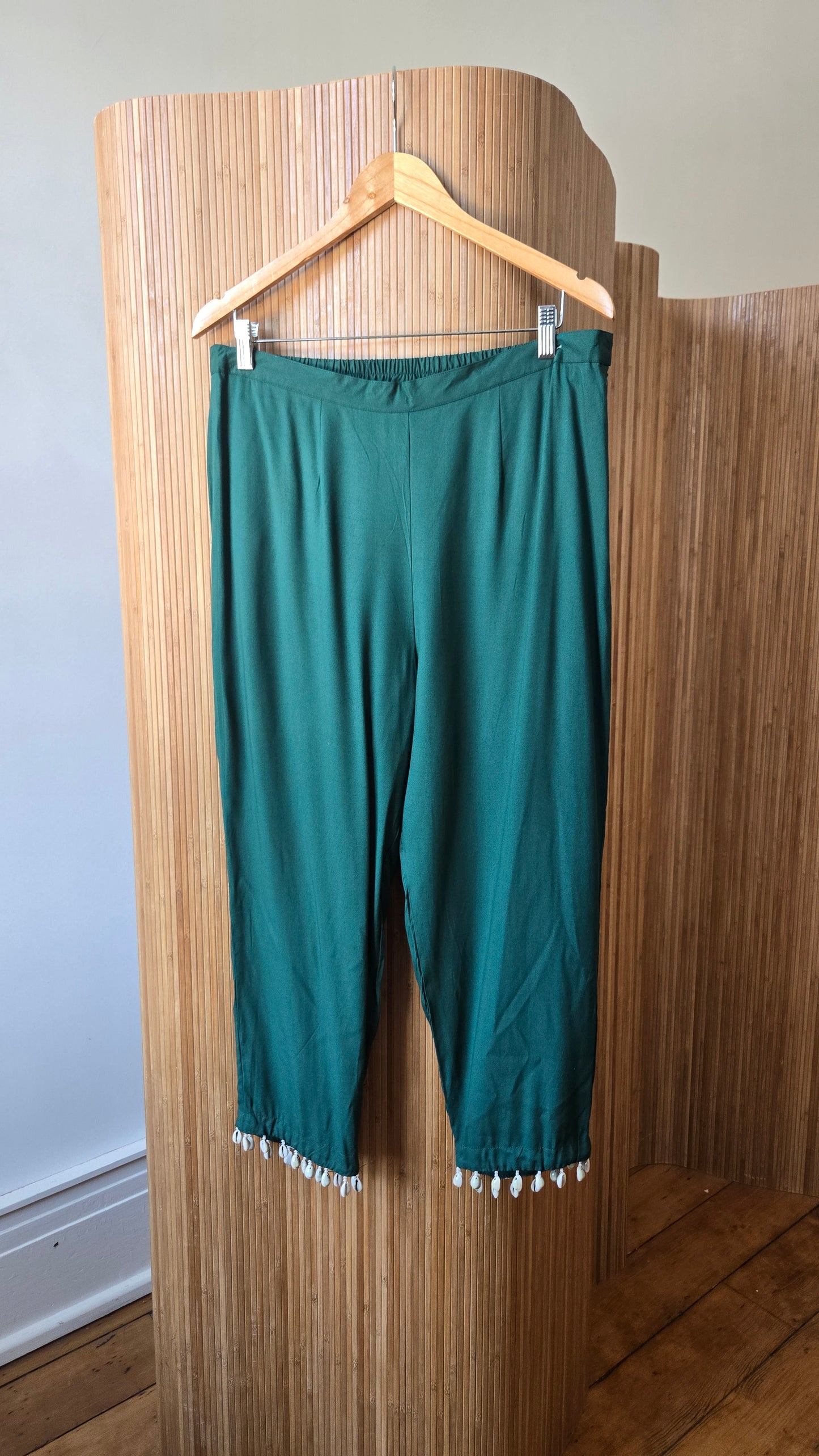 Green puka shell-trimmed pants!