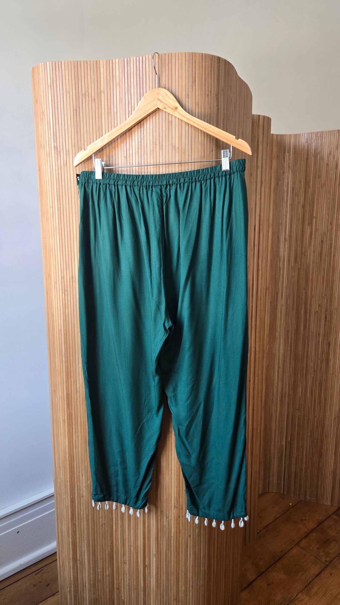 Green puka shell-trimmed pants!