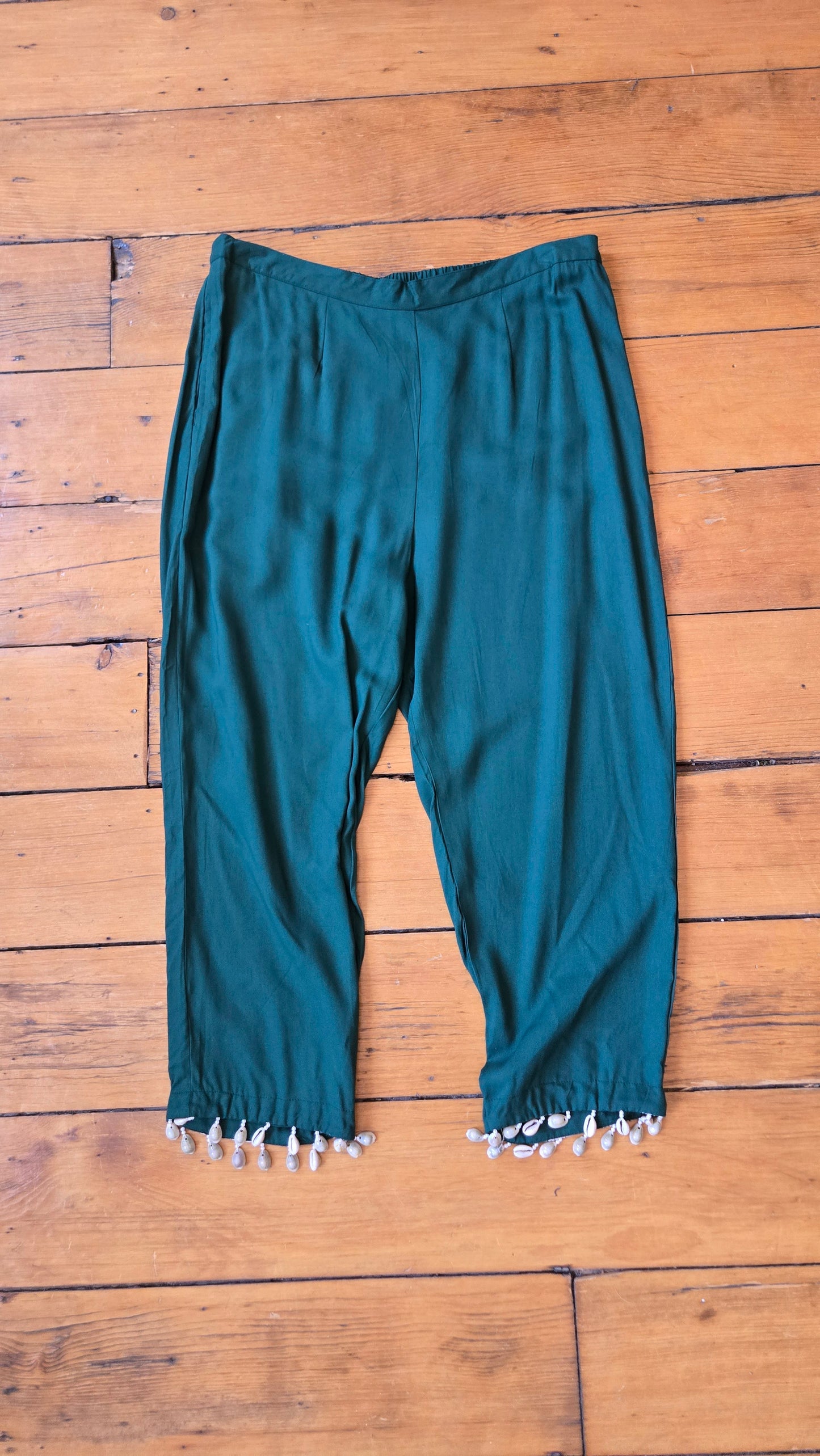 Green puka shell-trimmed pants!