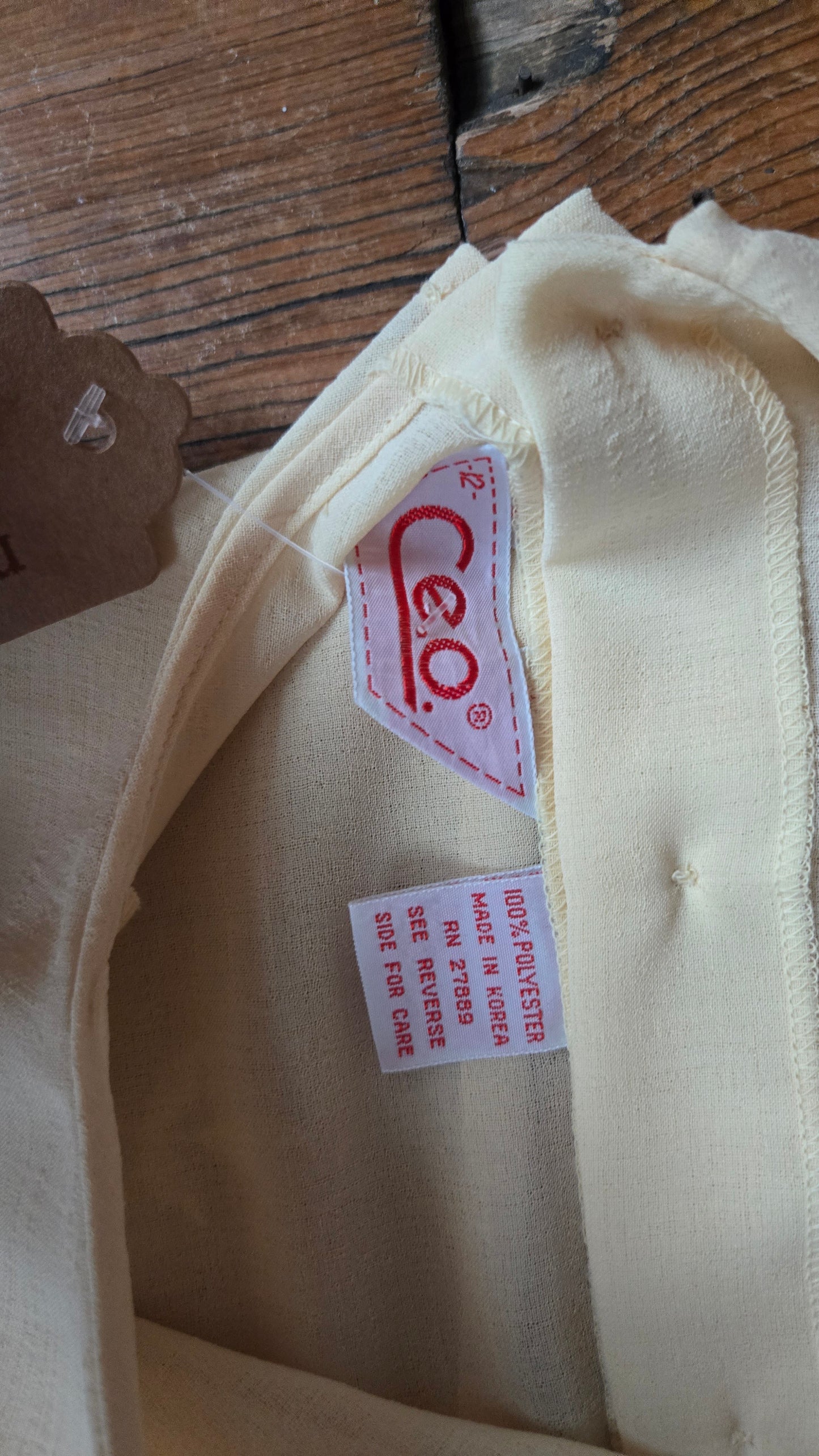CEO sheer yellow bib collar shirt