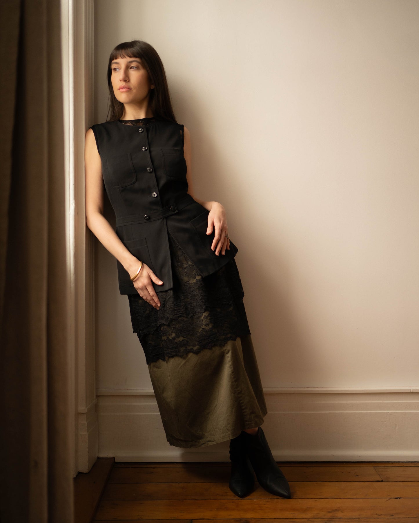 Black crewneck tunic vest