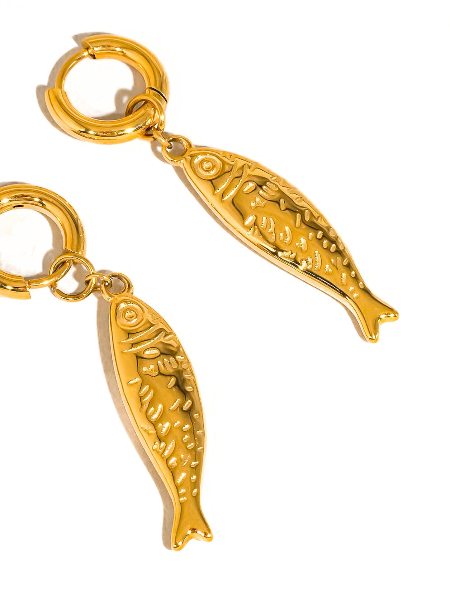 Nibe gold fish dangle earring