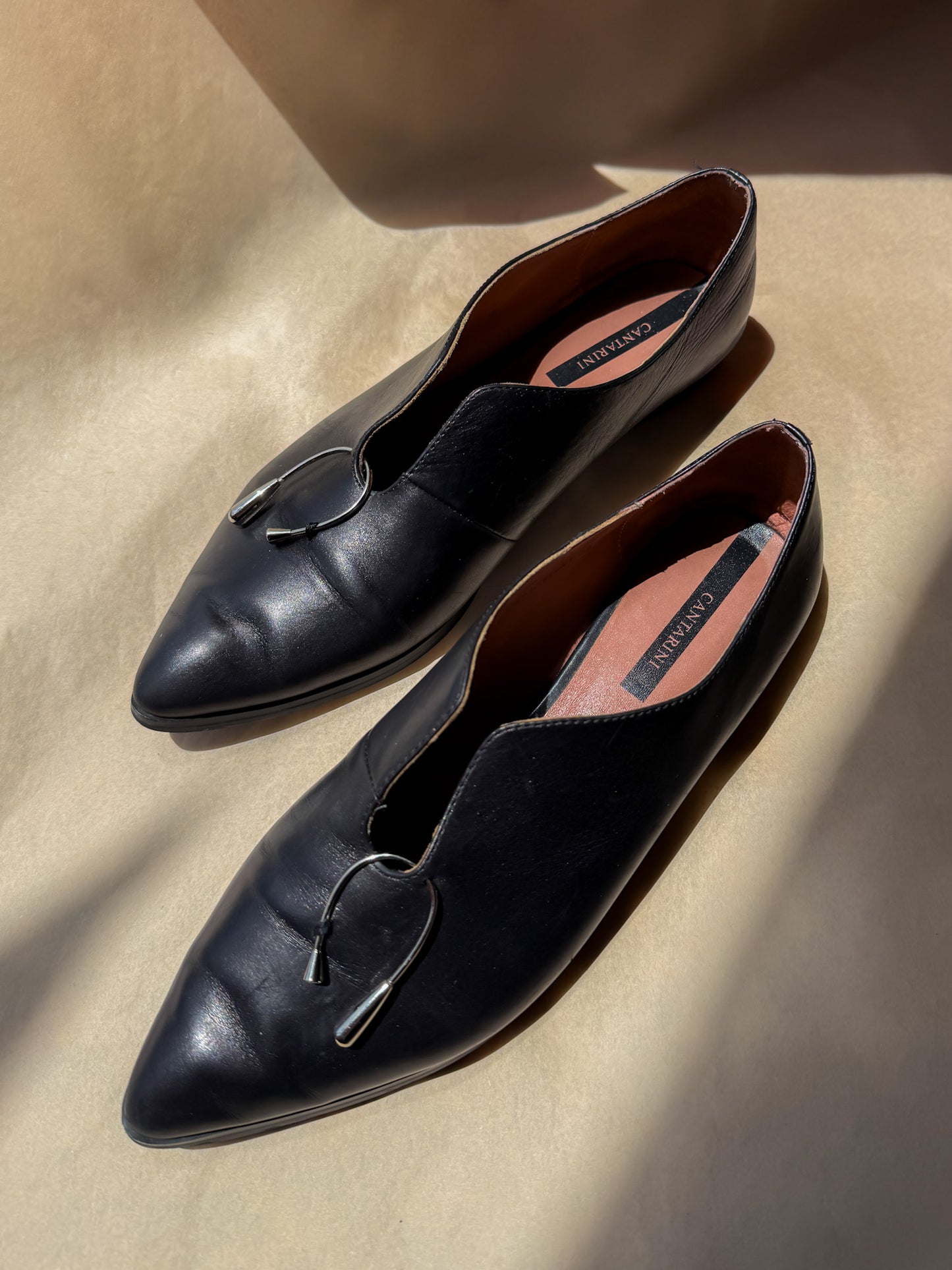 Cantarini pierced black flats!