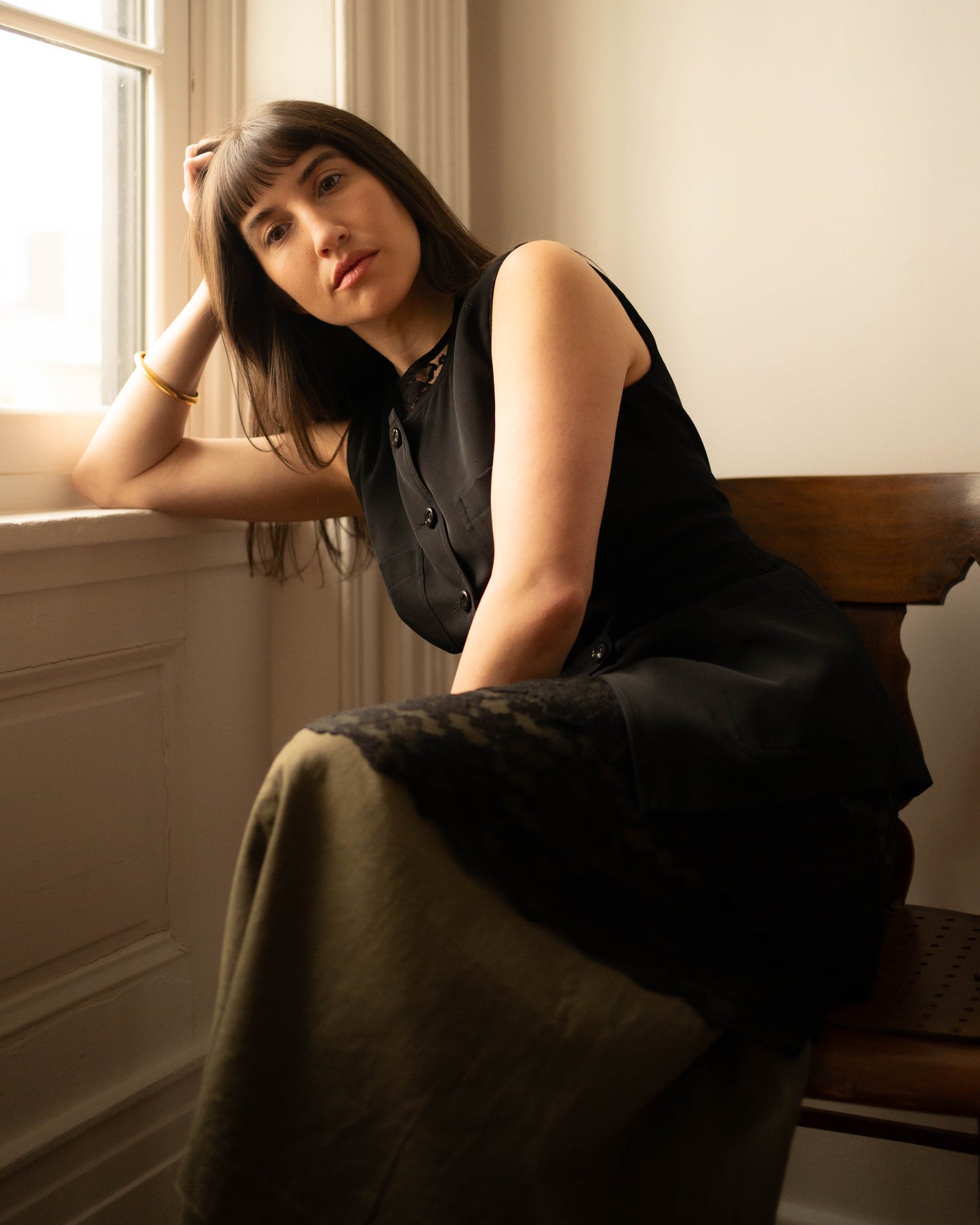 Black crewneck tunic vest