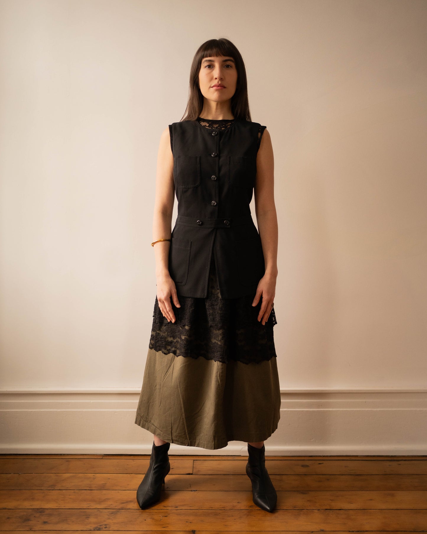 Black crewneck tunic vest