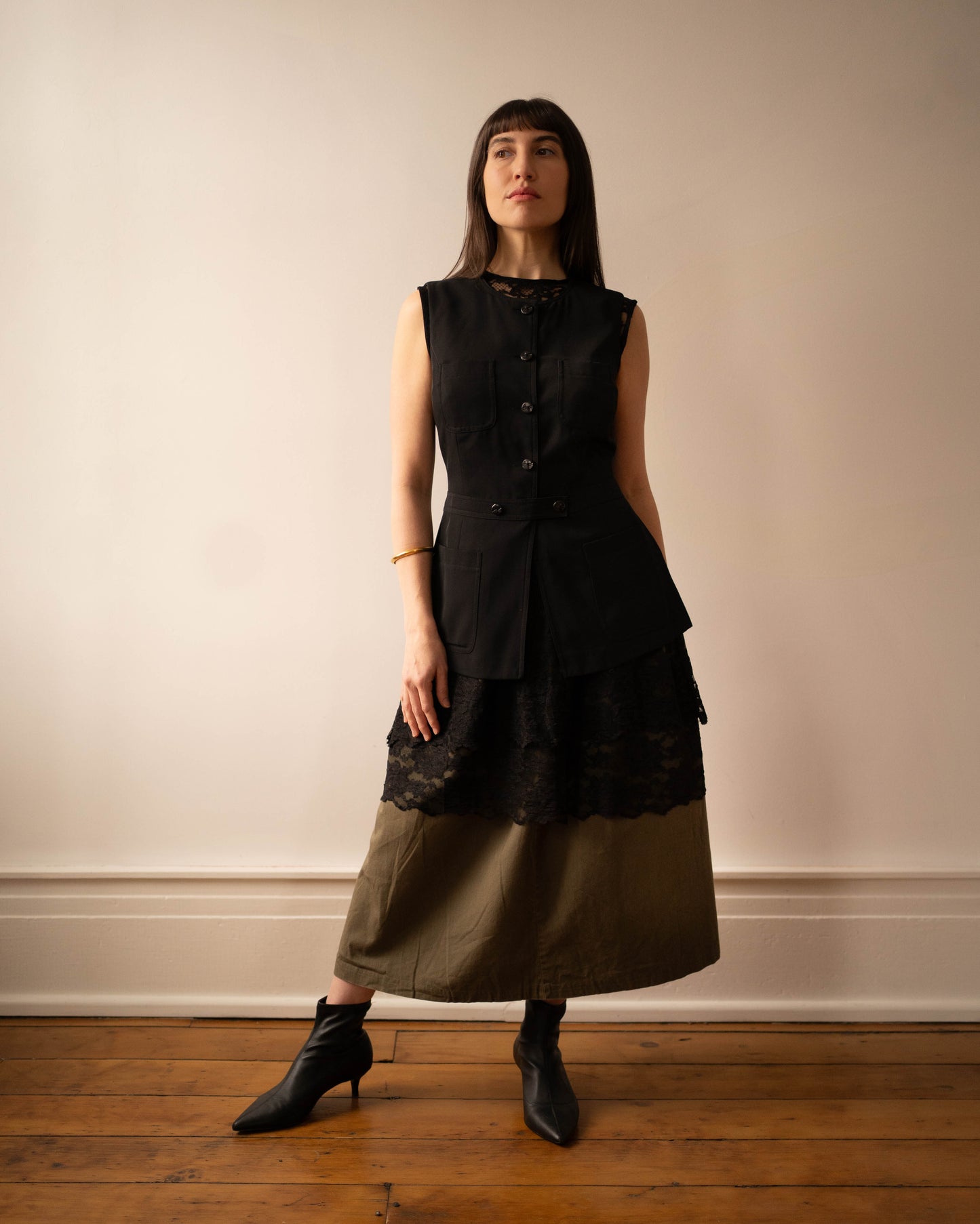 Black crewneck tunic vest