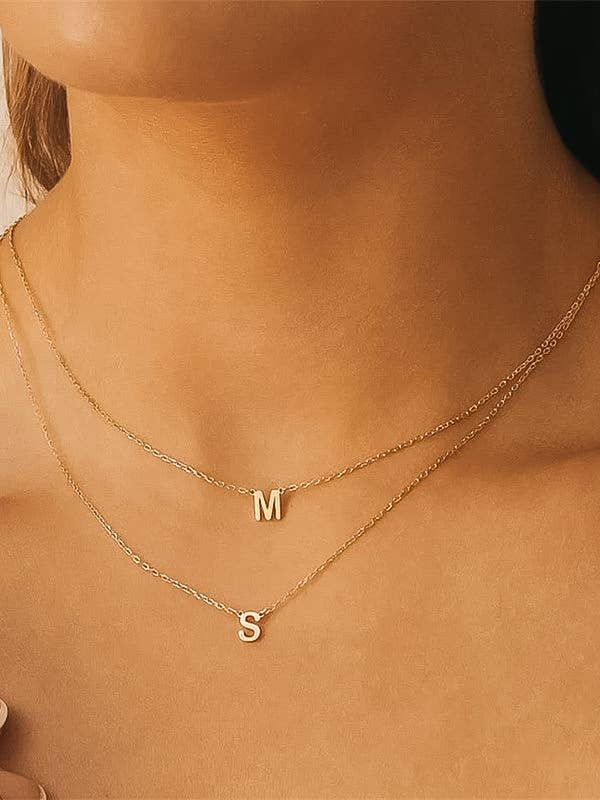 Desir gold petite initial necklace