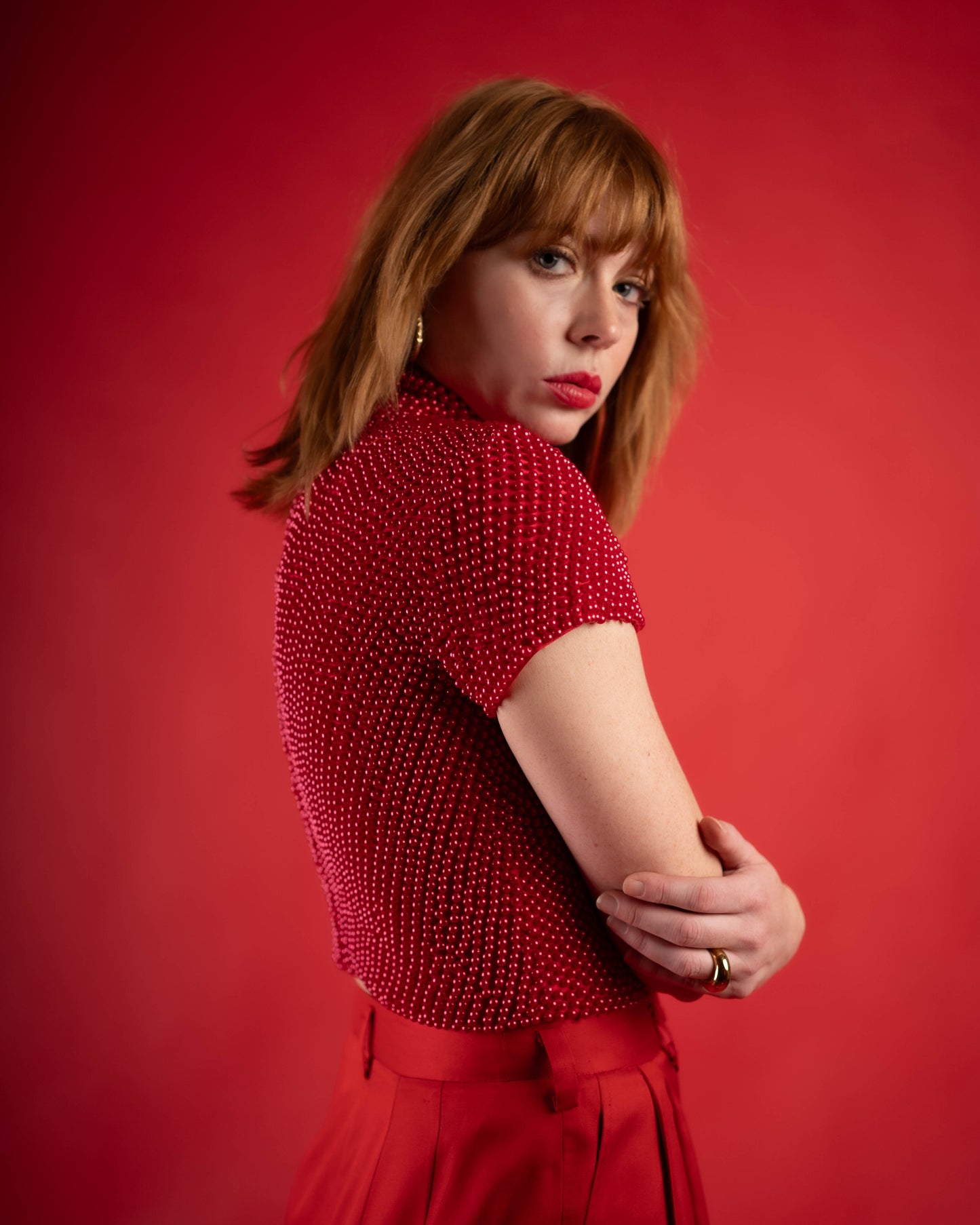 Caché beaded mock neck crop top