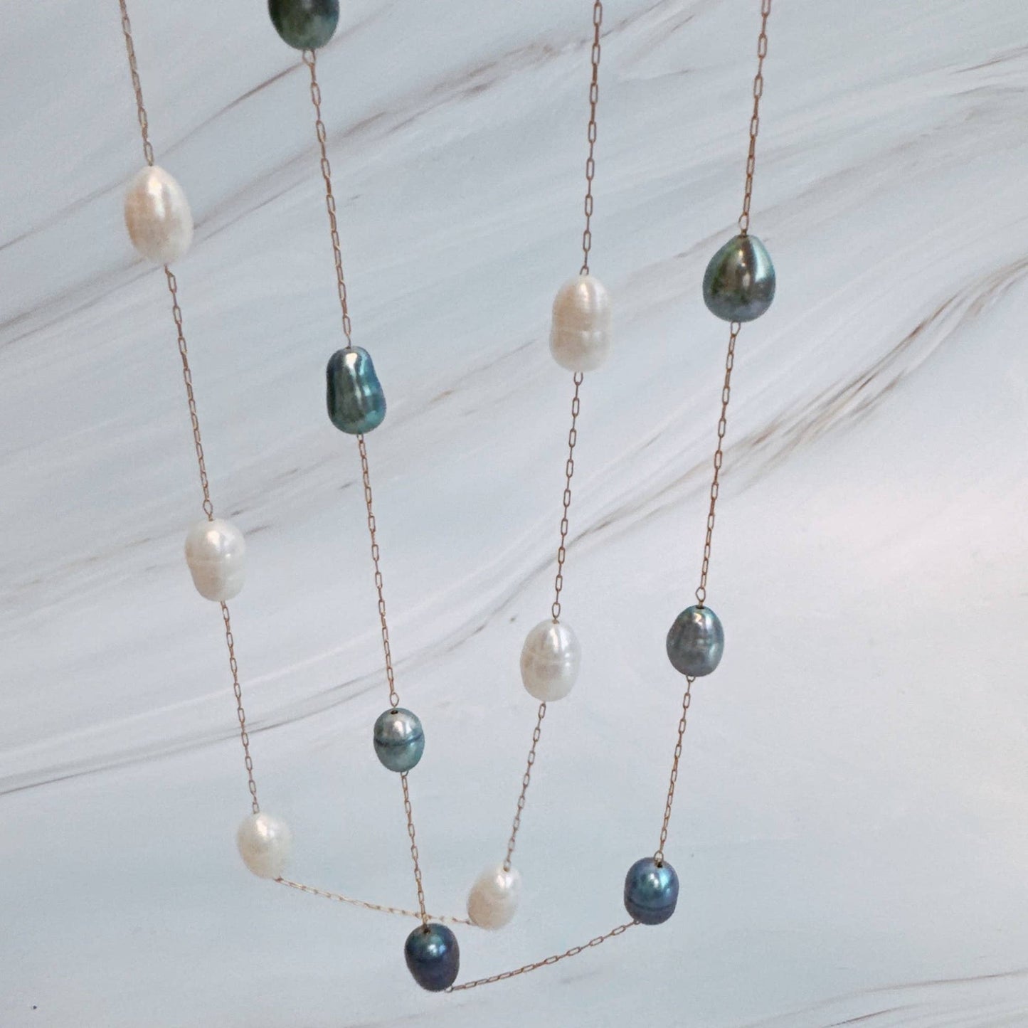 Esther Freshwater Pearl Station Necklace: Cream