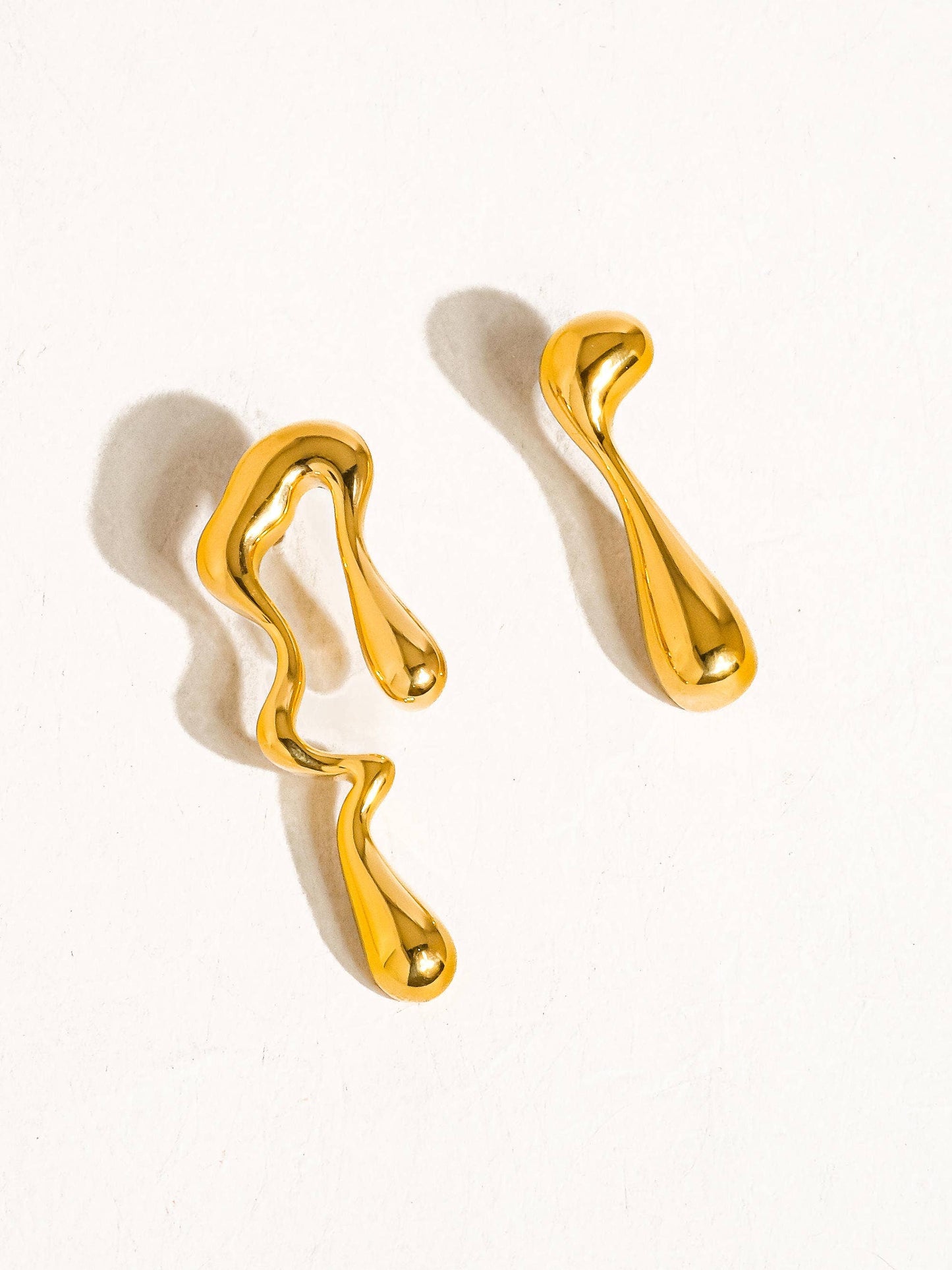 Roma gold mismatch melted earring