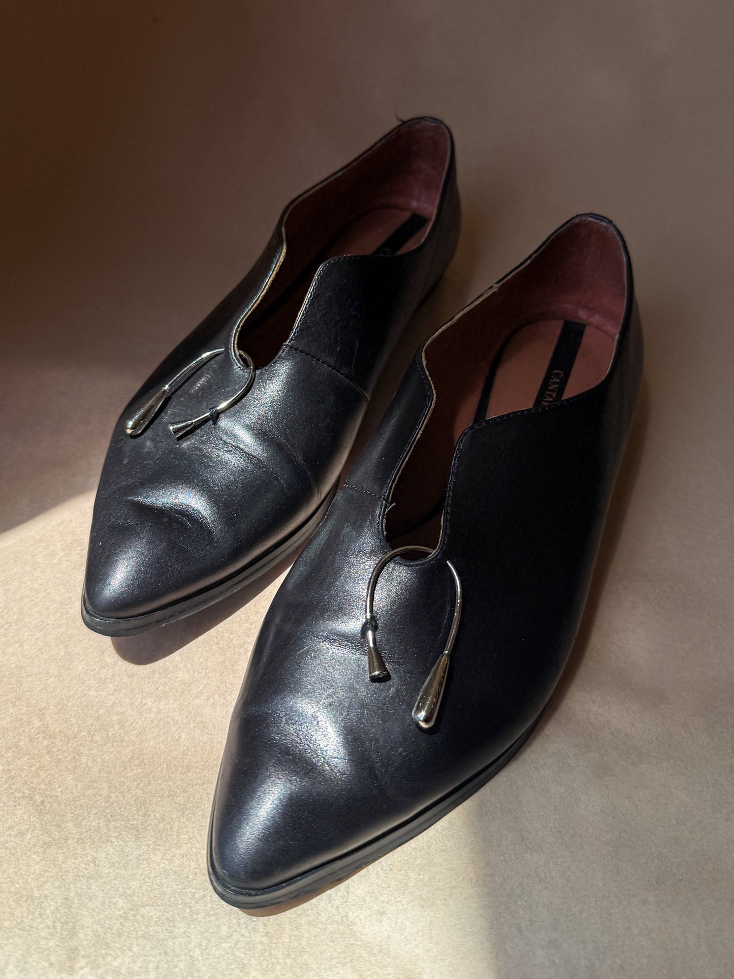 Cantarini pierced black flats!