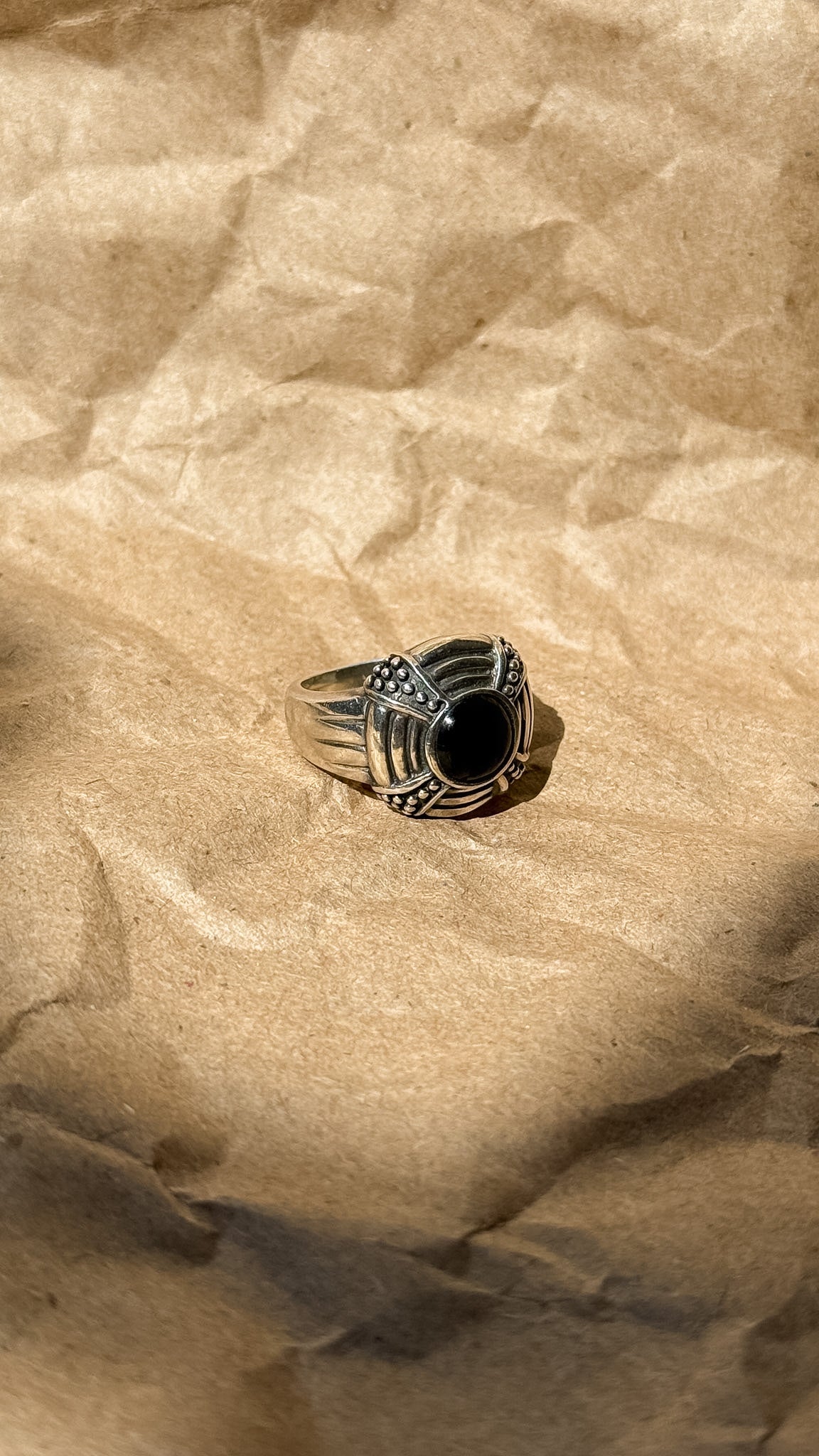 Decorative sterling silver & onyx ring