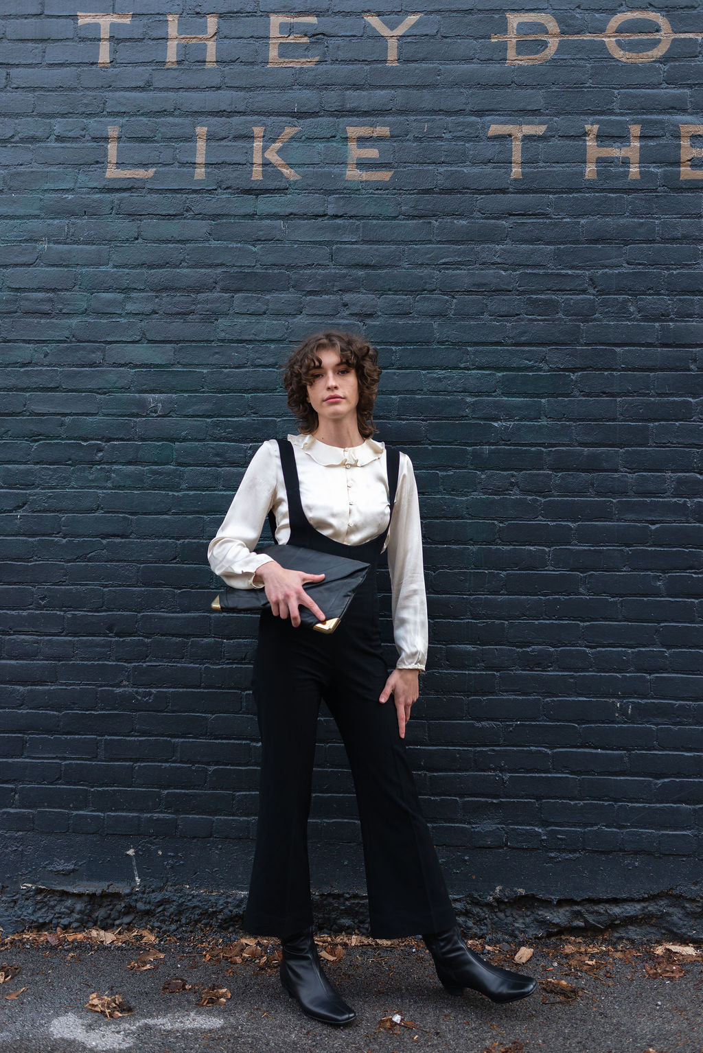 Lou Taylor black envelope clutch w metal hardware