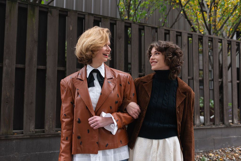 Black sleeveless chunky turtleneck
