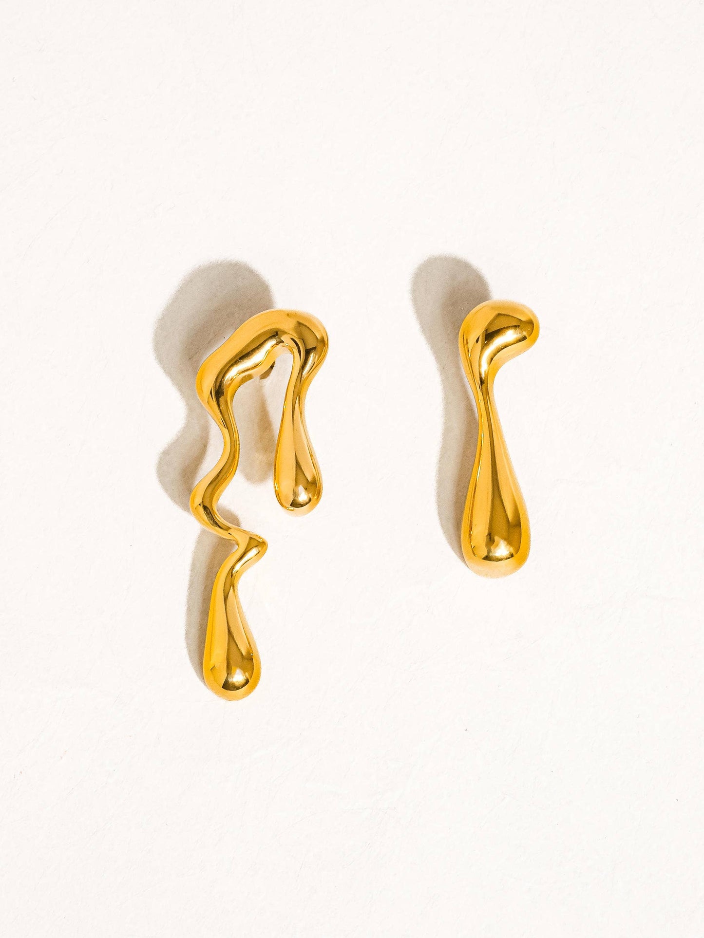 Roma gold mismatch melted earring